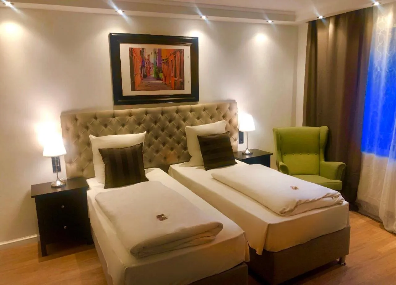 Bed in Hotel Ramor Garni