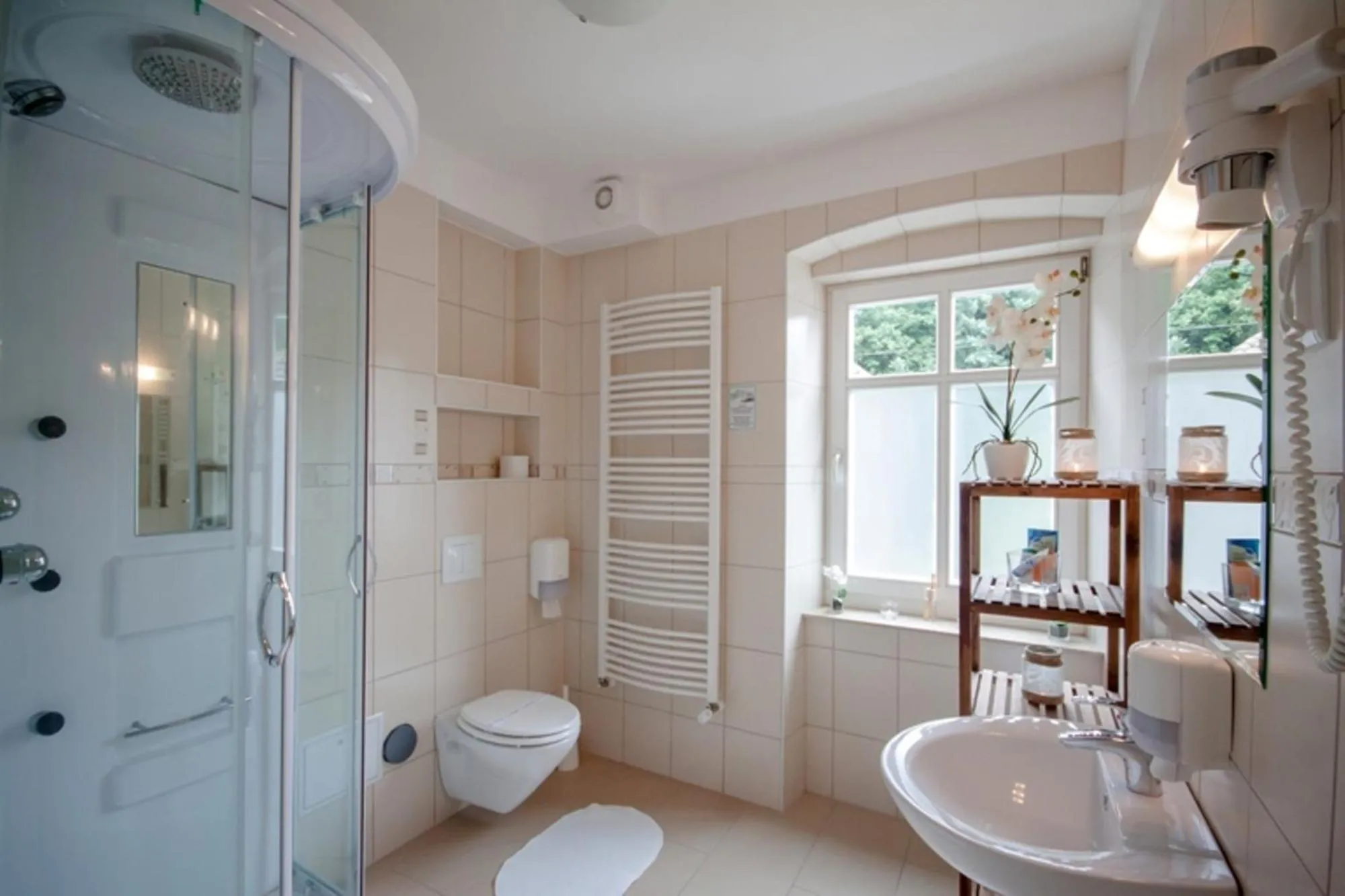 Bathroom in Hotel Villa Huber