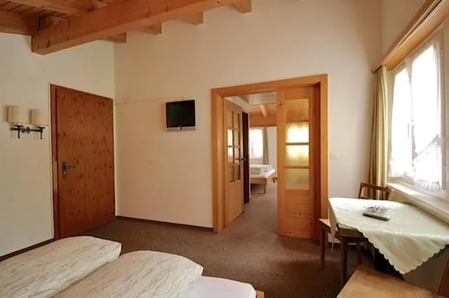 Photo of the whole room, Bed in Gasthaus Skiklub