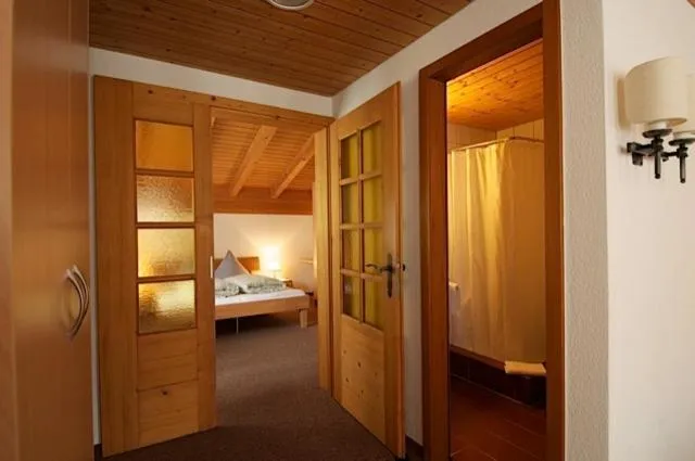 Photo of the whole room, Bed in Gasthaus Skiklub