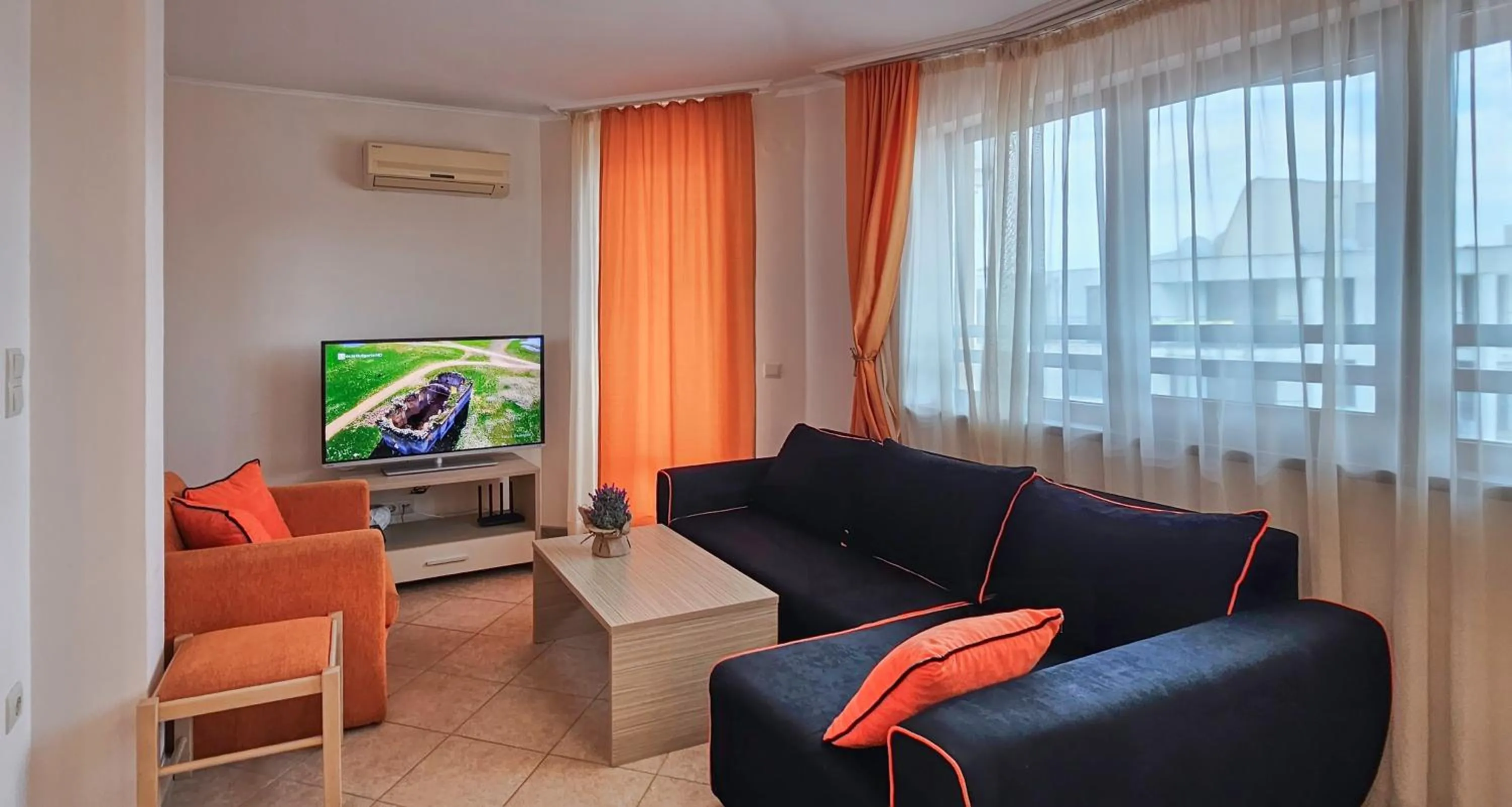 Bed in Royal Sun Apartments