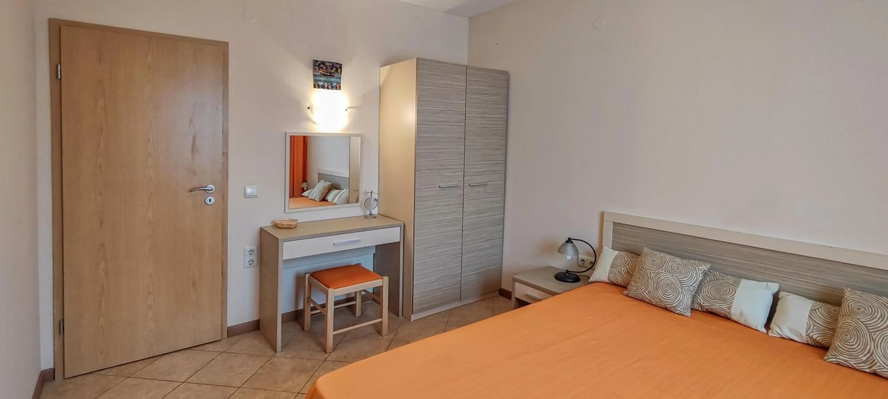 Bed in Royal Sun Apartments