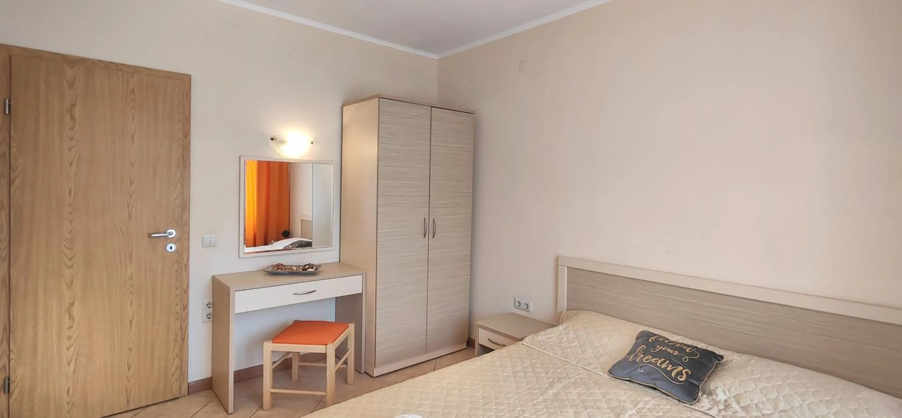 Bed in Royal Sun Apartments