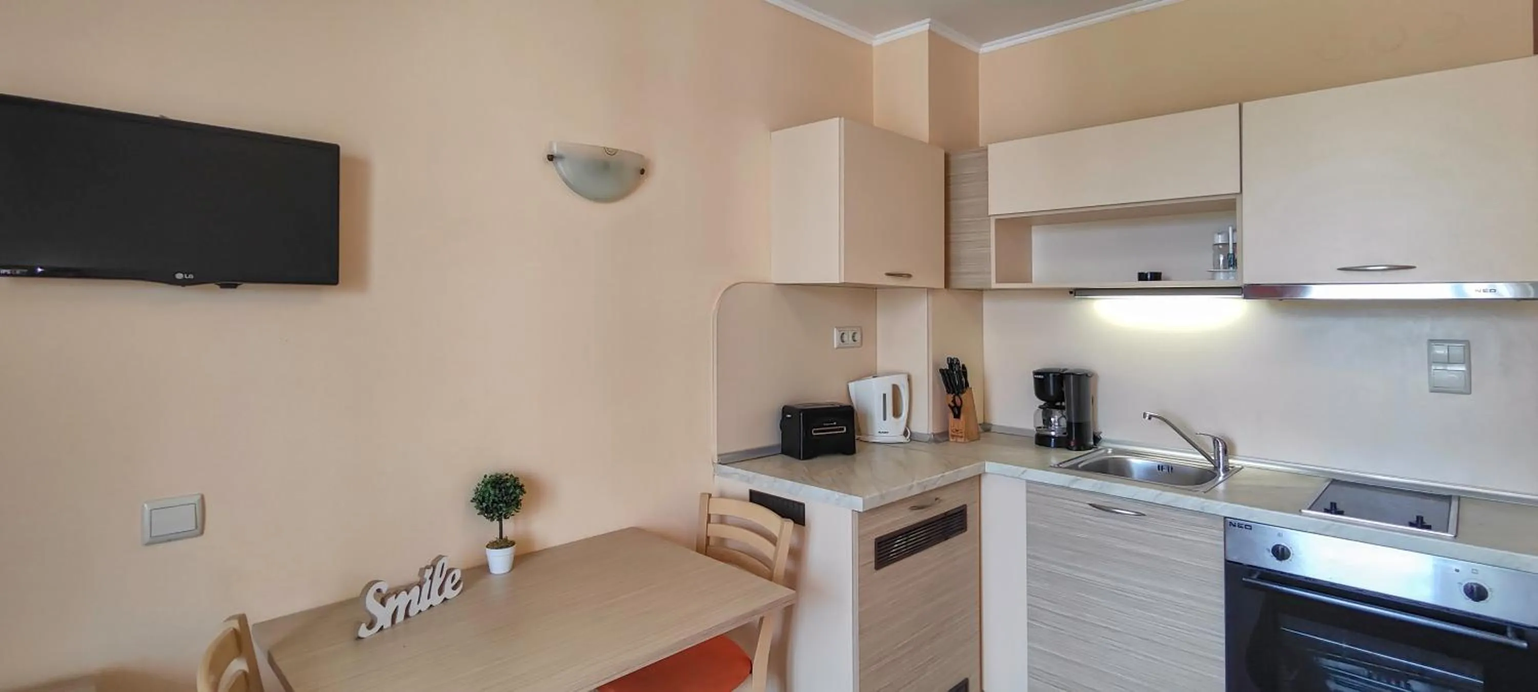 Kitchen or kitchenette in Royal Sun Apartments