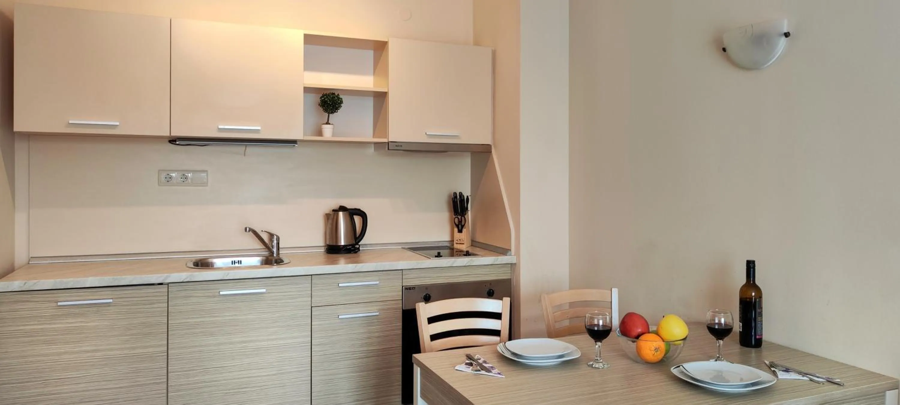 Kitchen or kitchenette in Royal Sun Apartments