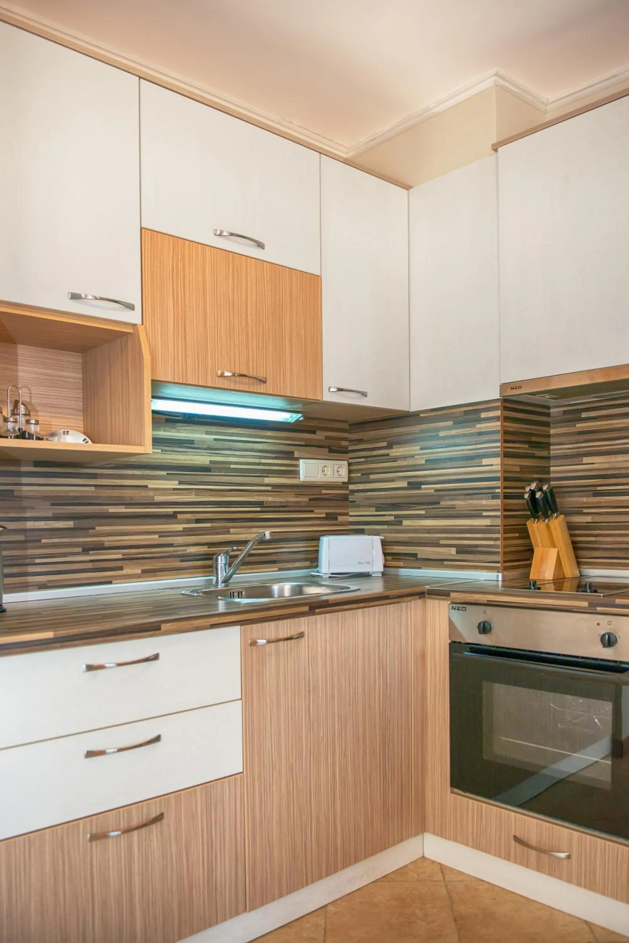 Kitchen or kitchenette in Royal Sun Apartments