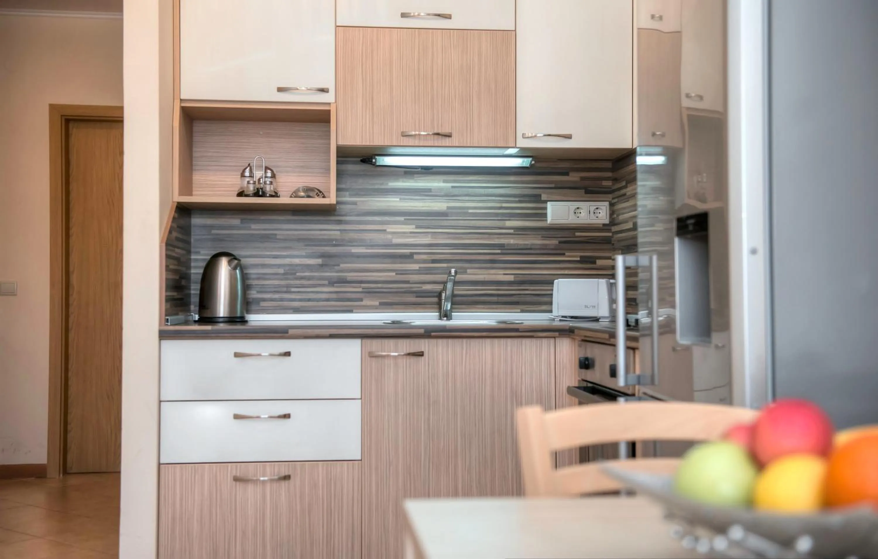 Kitchen or kitchenette in Royal Sun Apartments