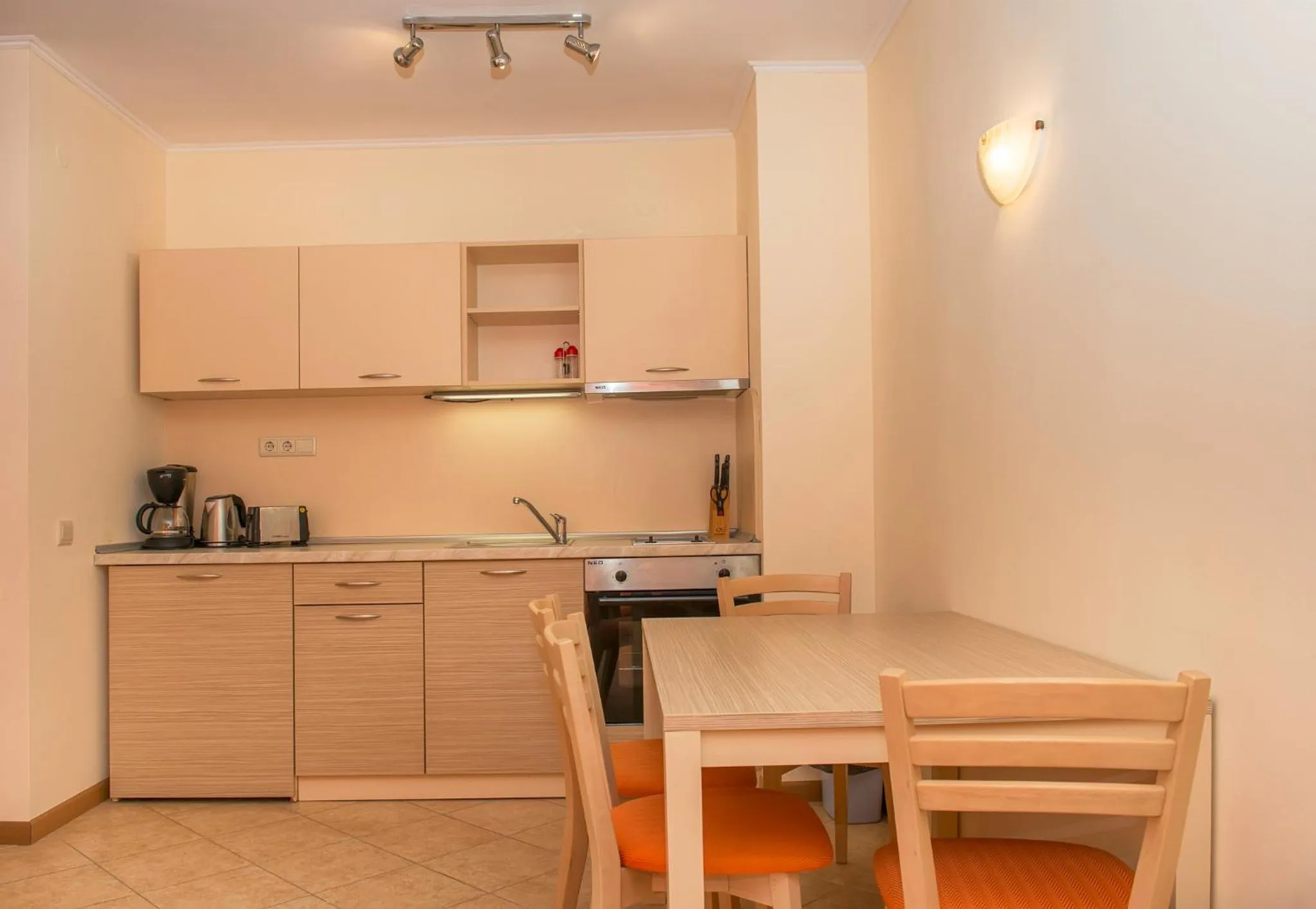 Kitchen or kitchenette in Royal Sun Apartments