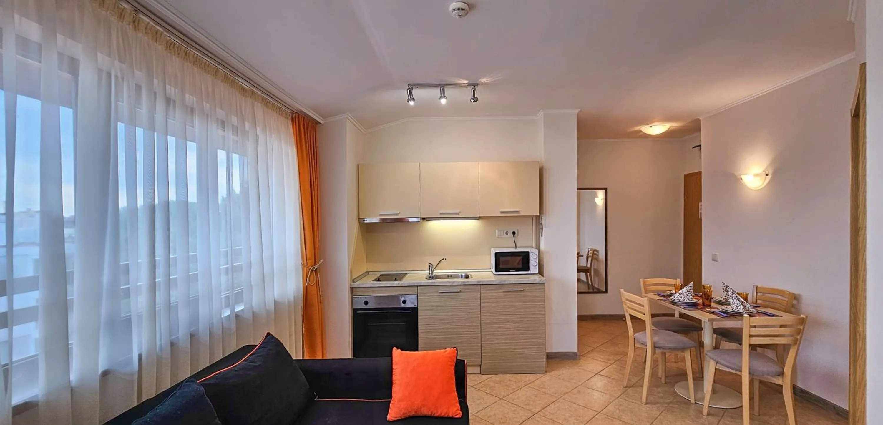 Bed in Royal Sun Apartments