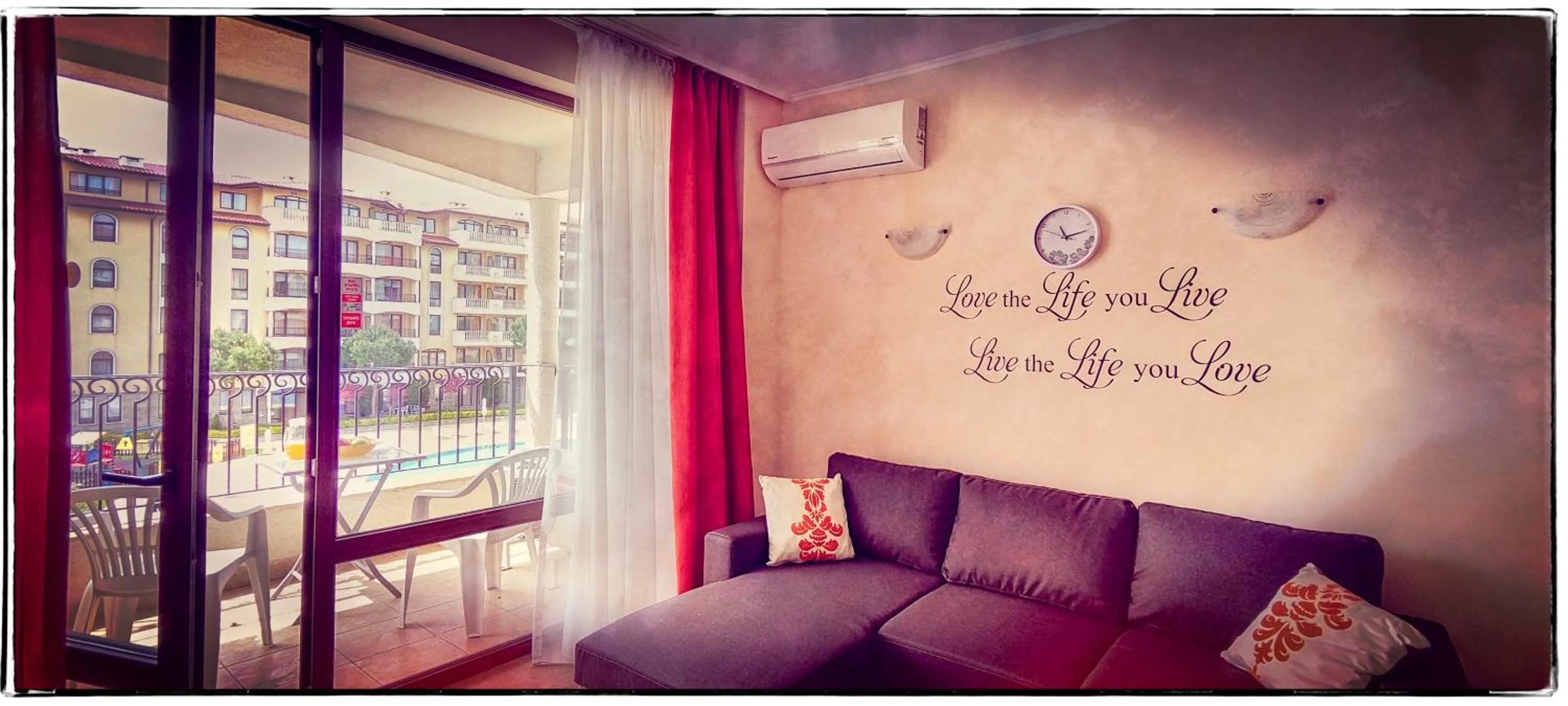 Bed in Royal Sun Apartments