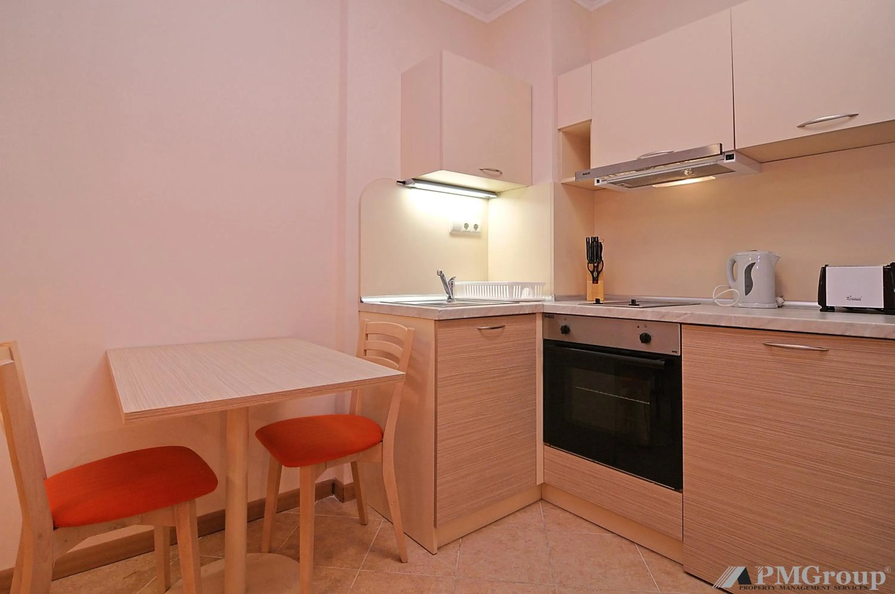 Kitchen or kitchenette in Royal Sun Apartments