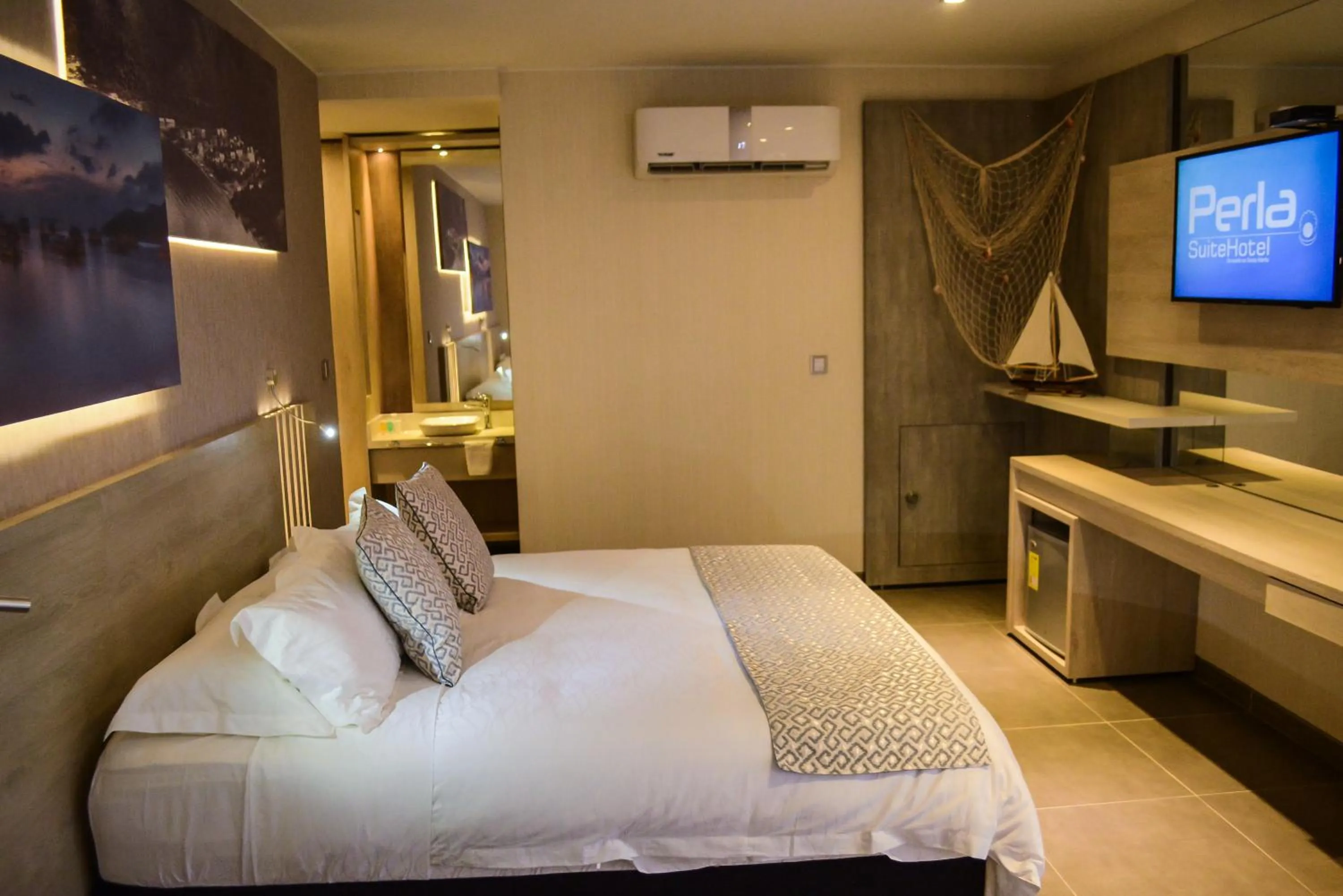 Bedroom, Bed in Hotel Perla Suite Santa Marta