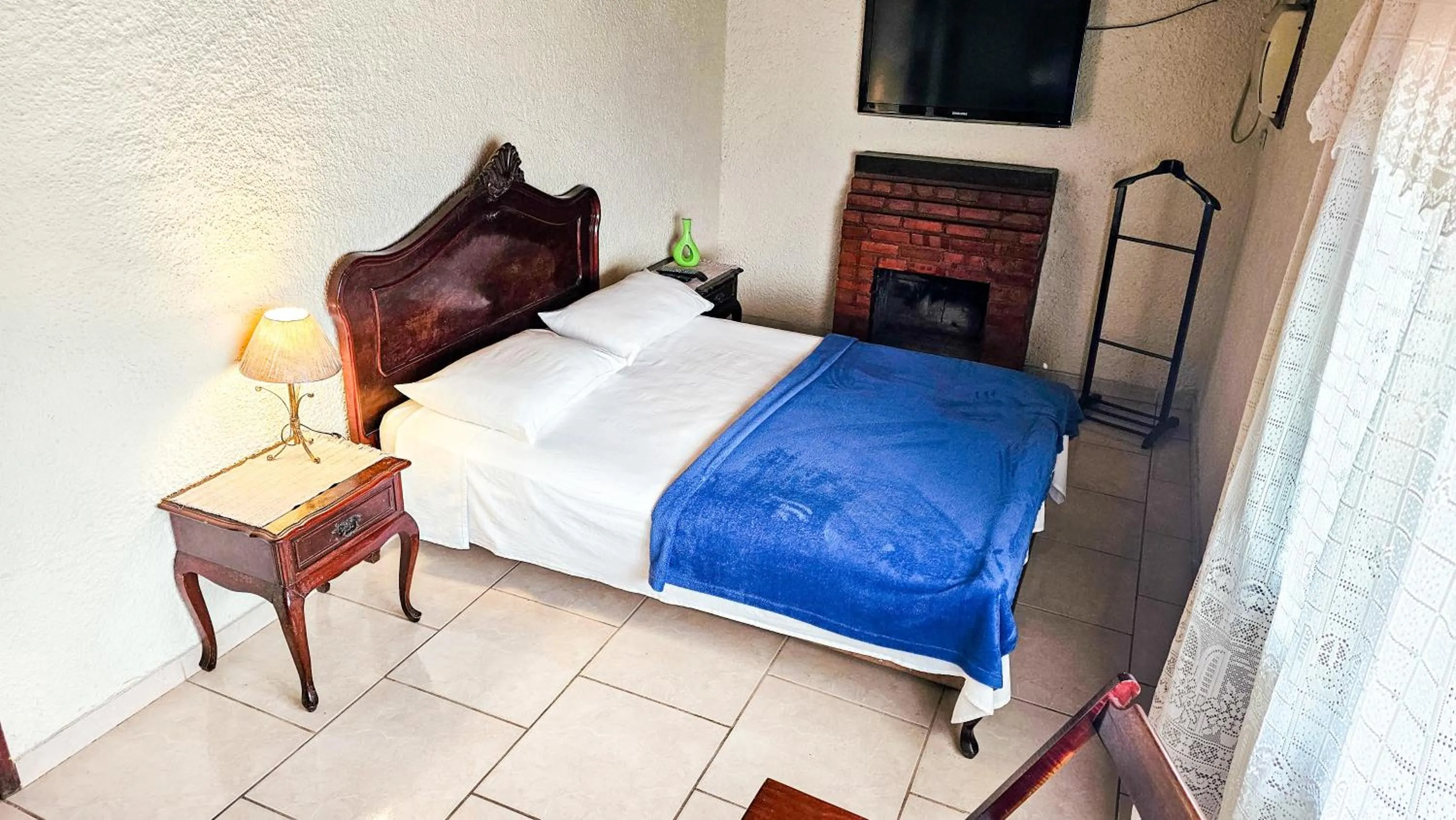 Bed in Pousada Chale da Montanha