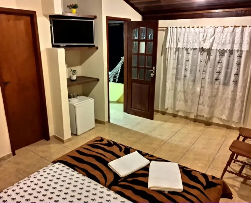 Bed in Pousada Chale da Montanha