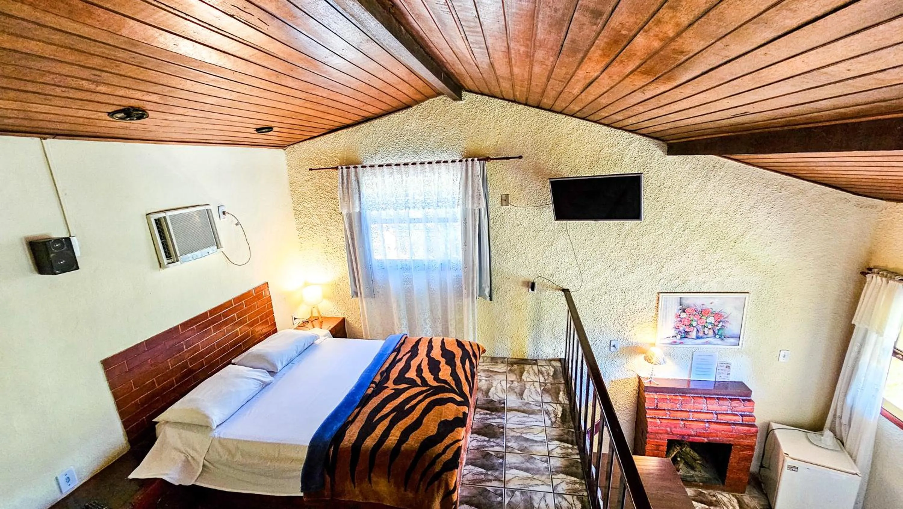 Bed in Pousada Chale da Montanha