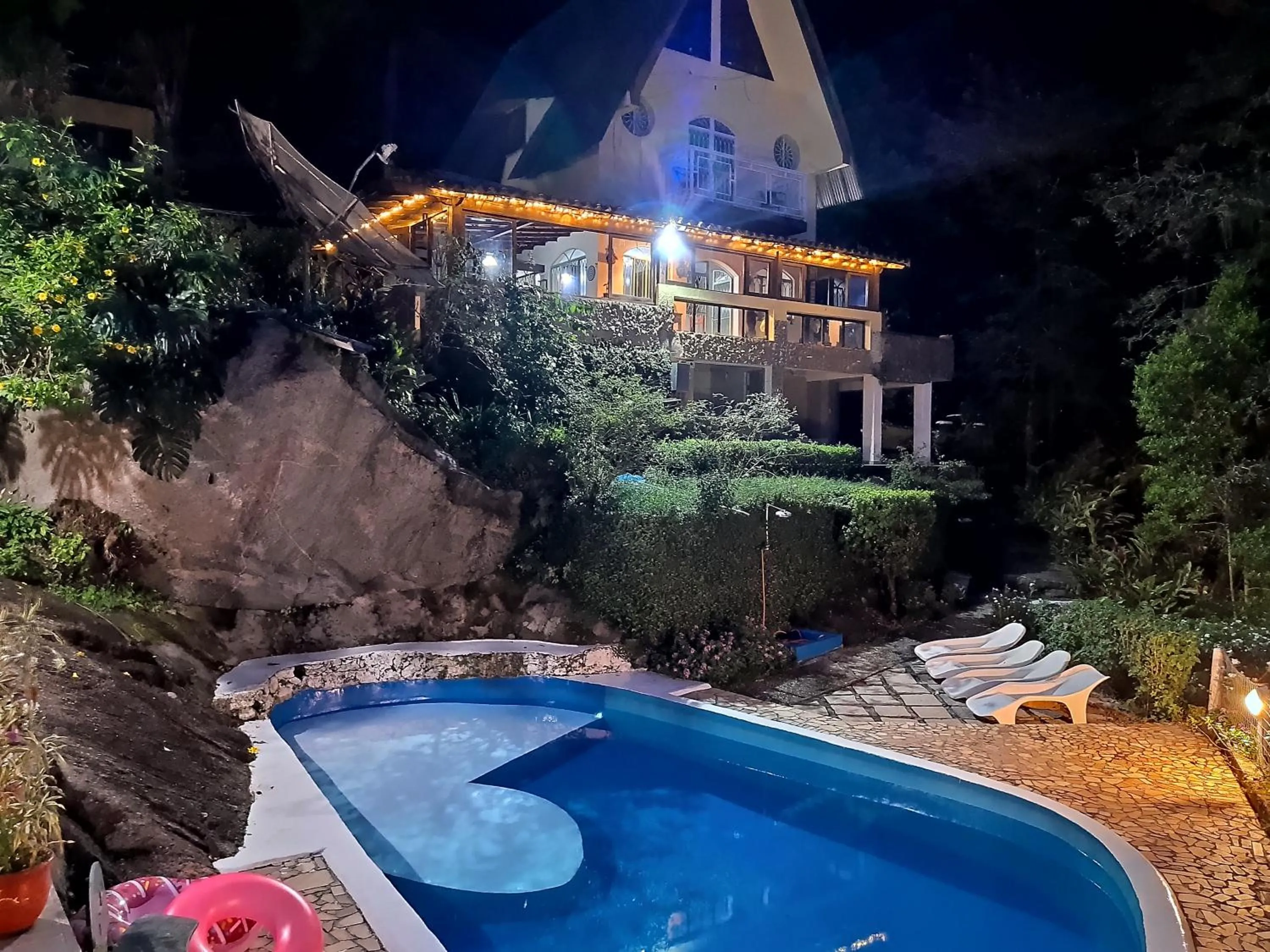 Swimming pool in Pousada Chale da Montanha