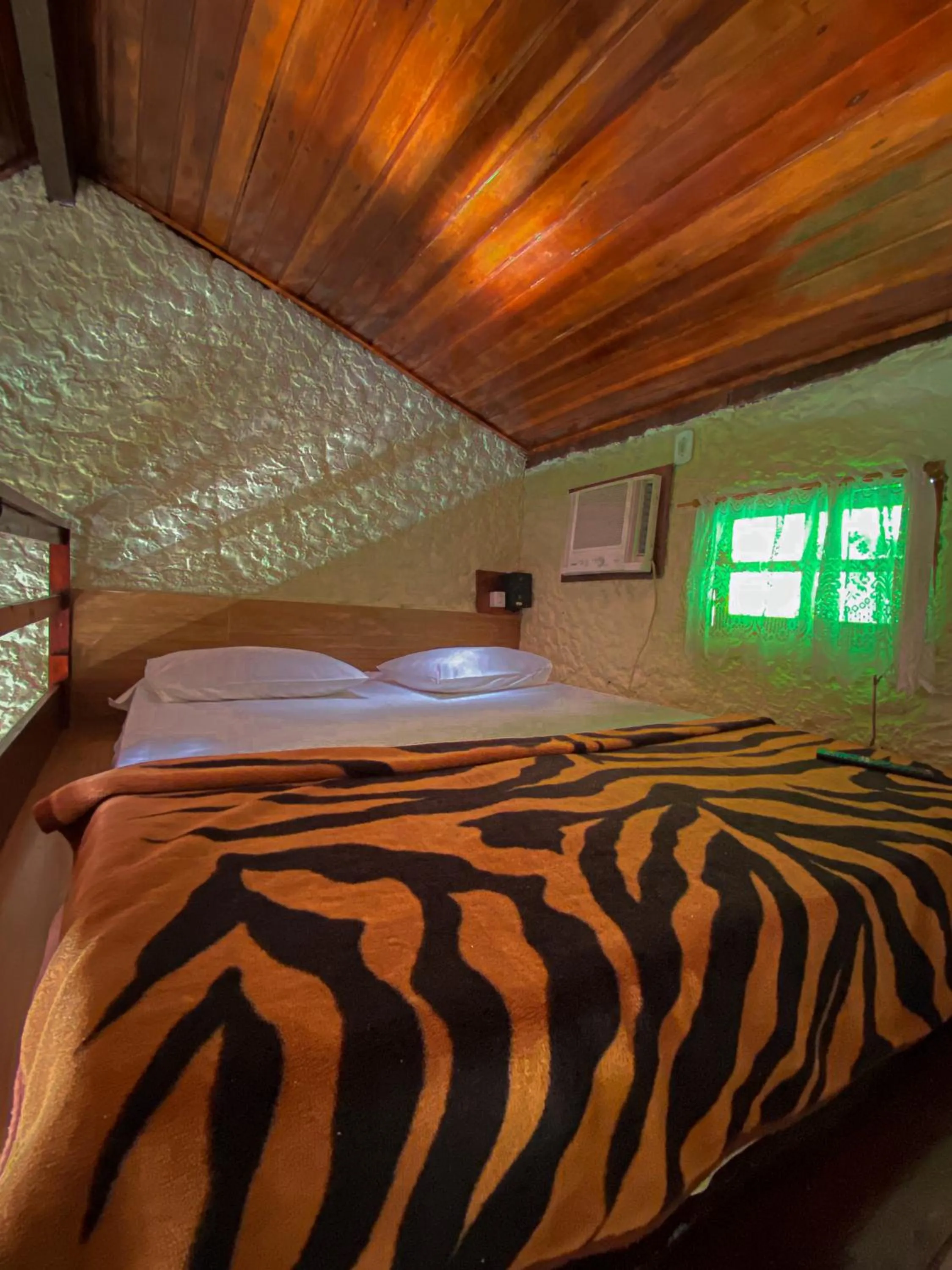 Bed in Pousada Chale da Montanha