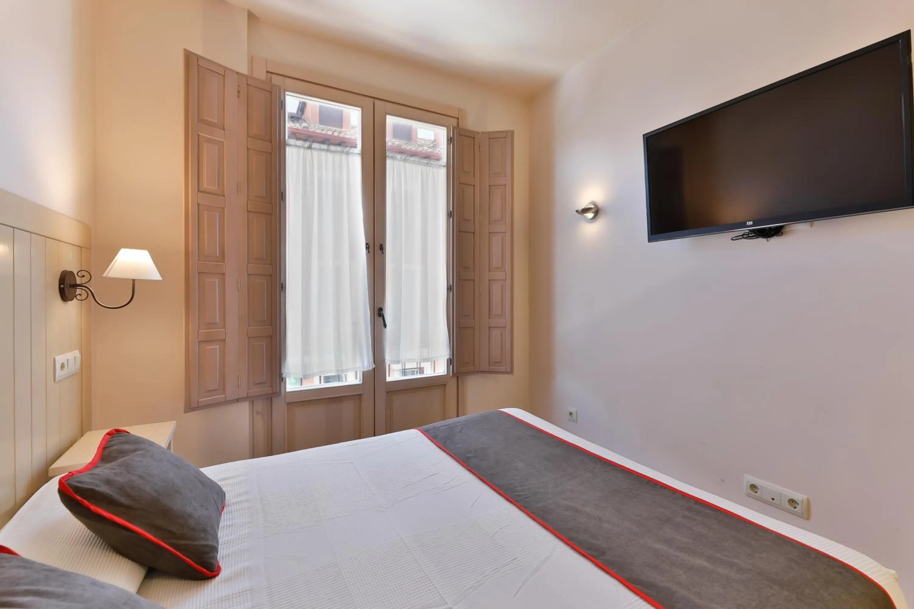 Bedroom, Bed in Hostal La Chata by Vivere Stays