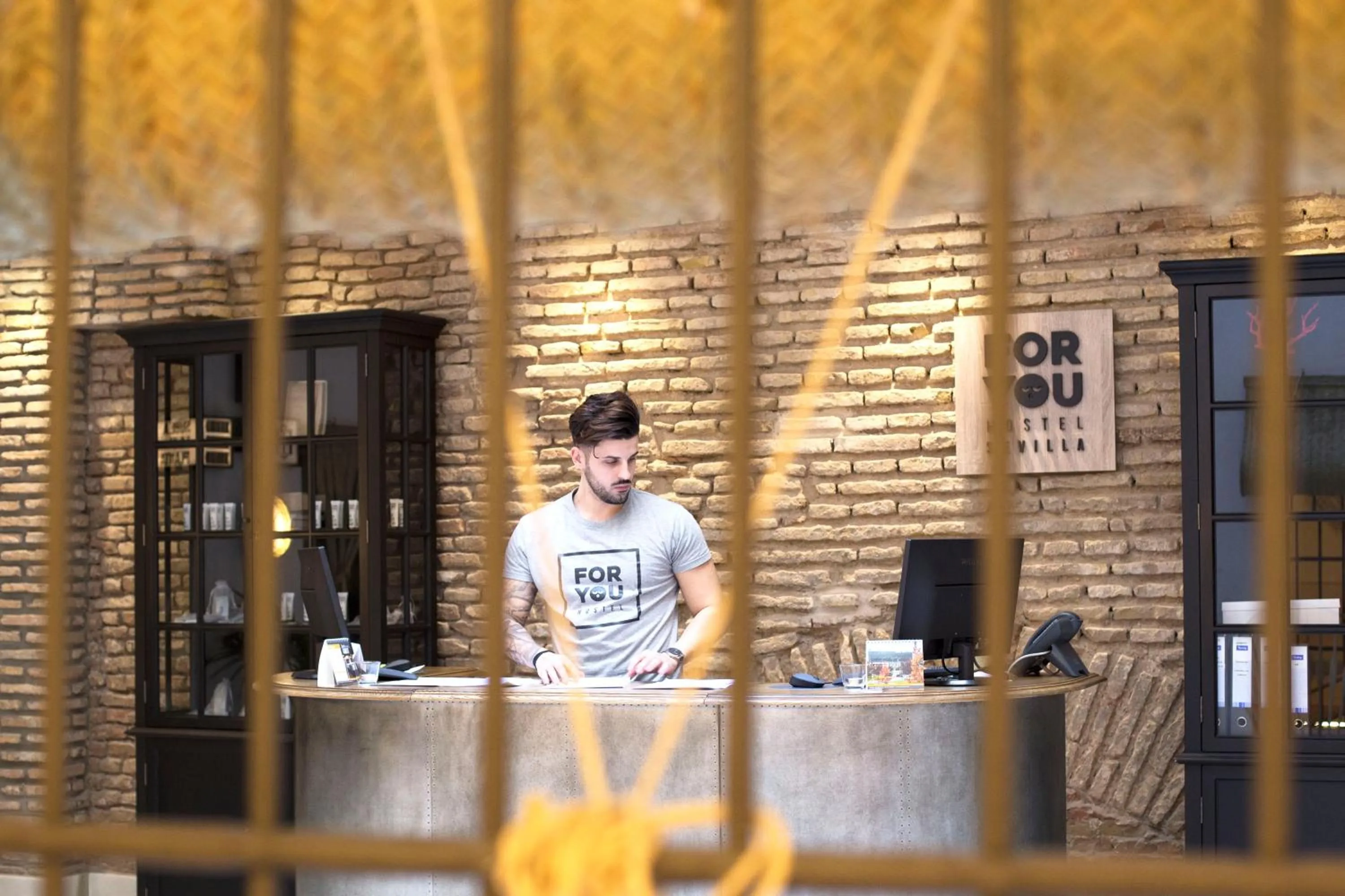 Staff in U-Sense For You Hostel Sevilla