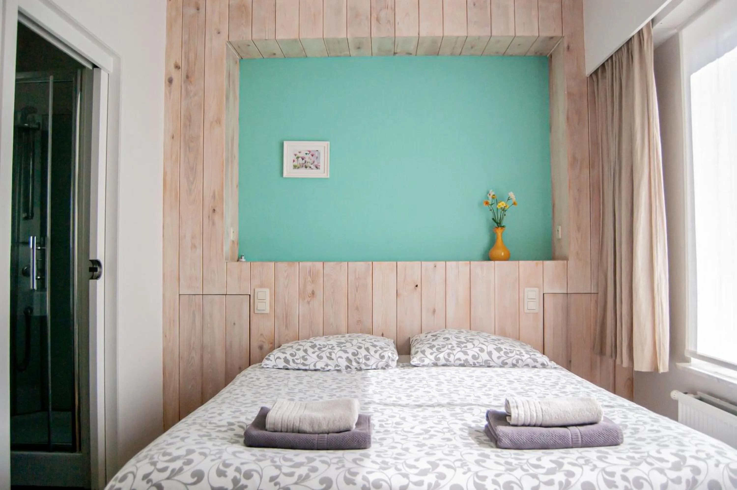 Bed in B&B Tuin der Zinnen