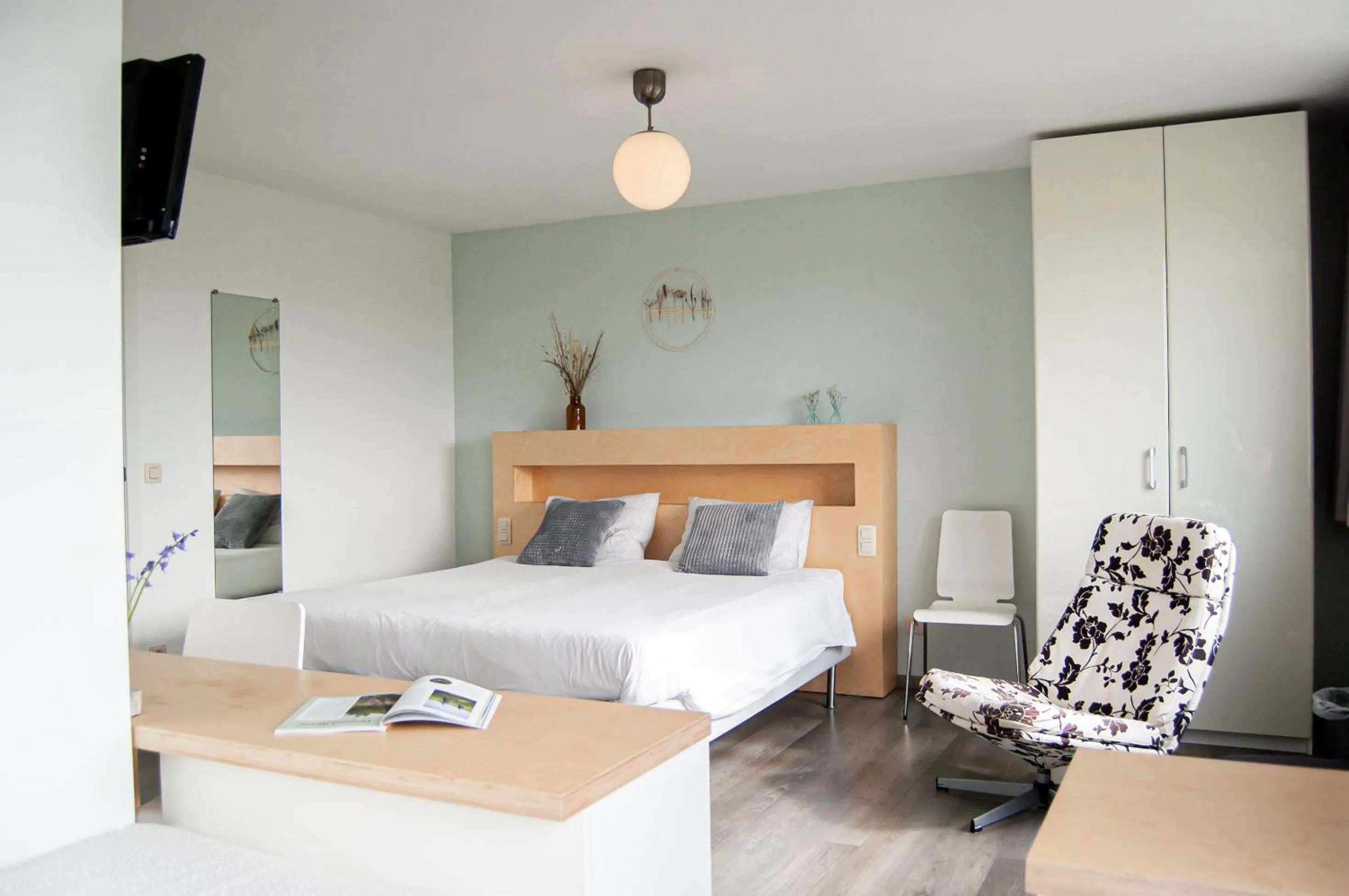 Bed in B&B Tuin der Zinnen