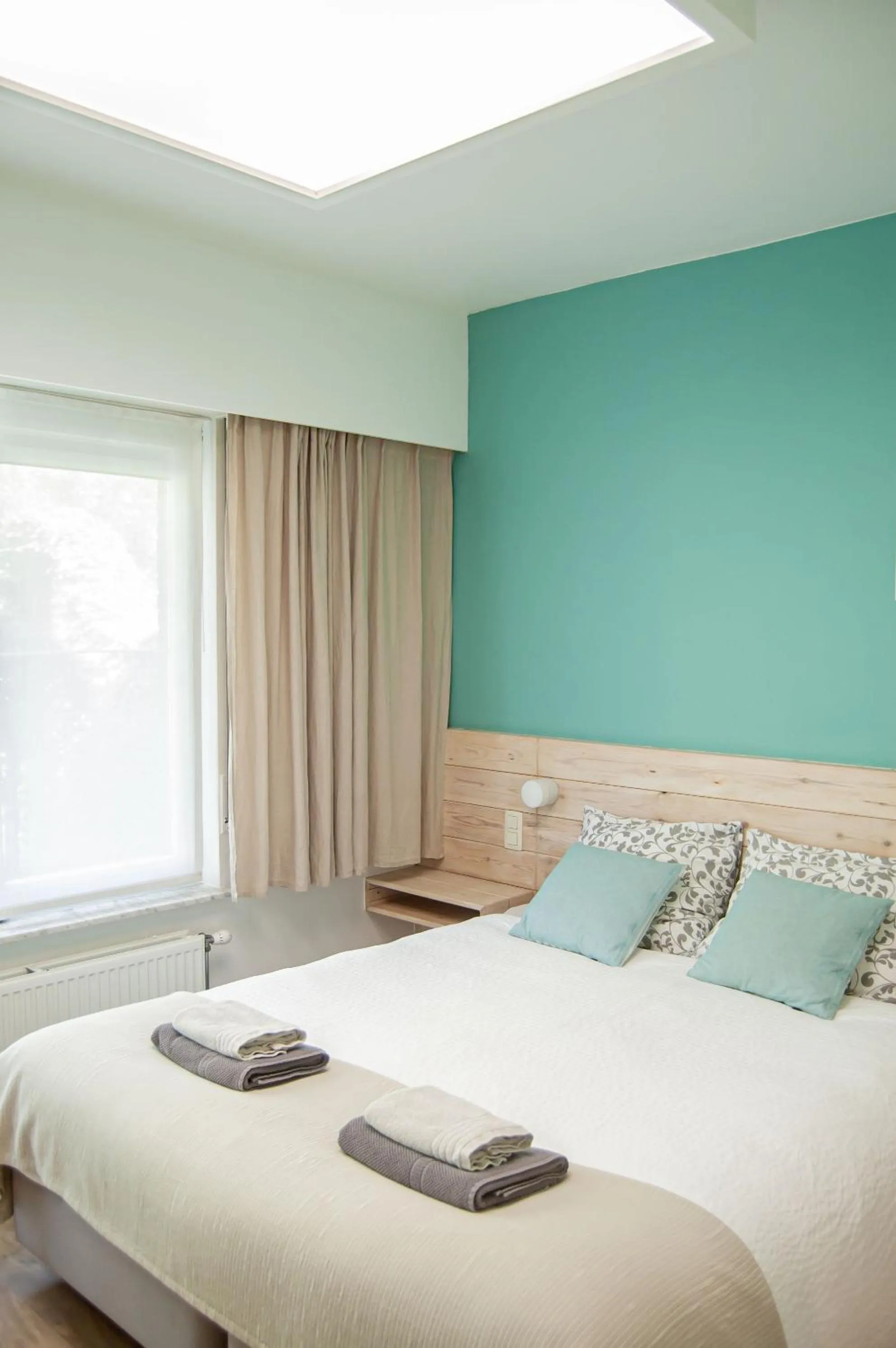 Bed in B&B Tuin der Zinnen