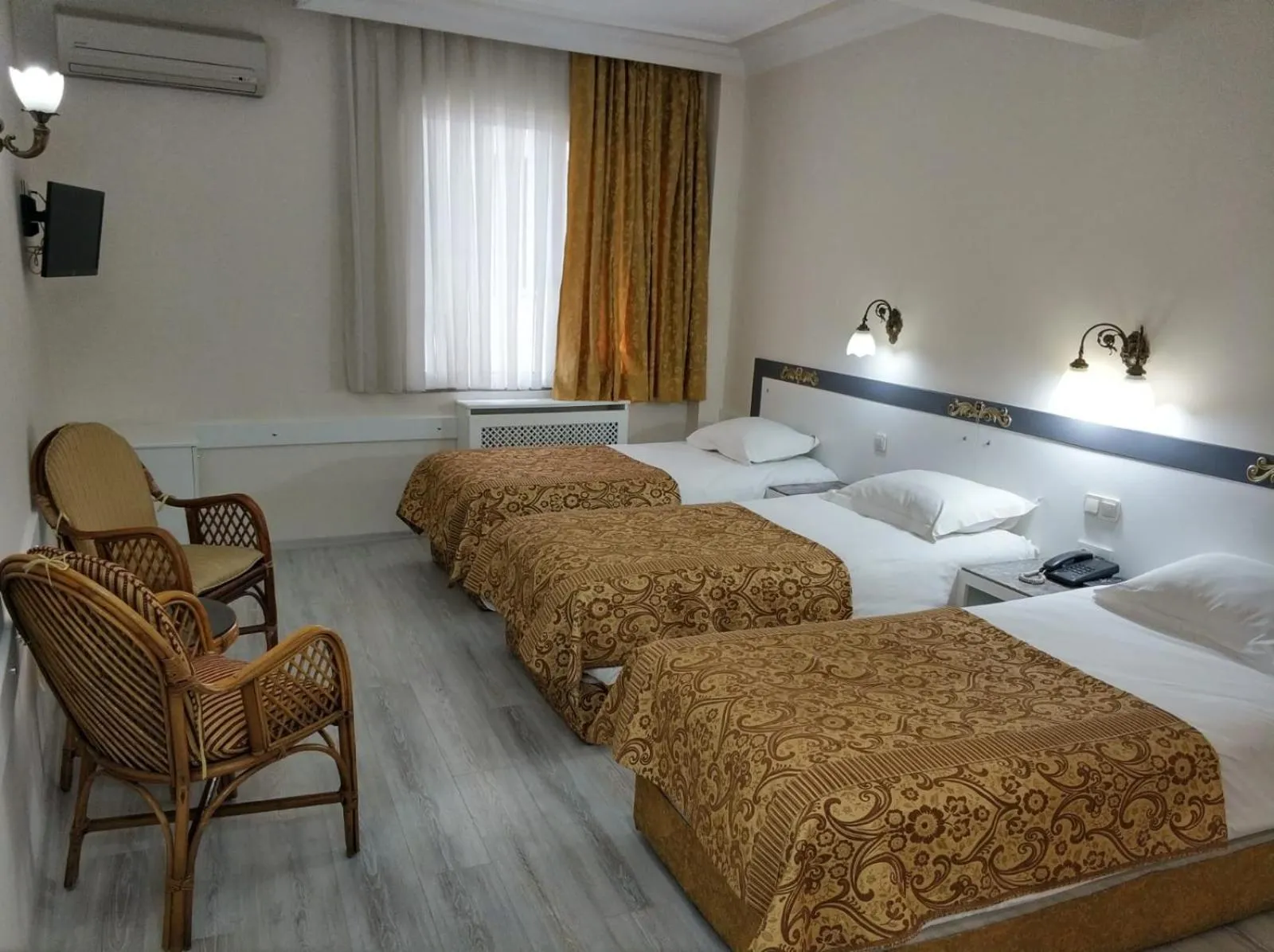 Seating area, Bed in Hali Hotel