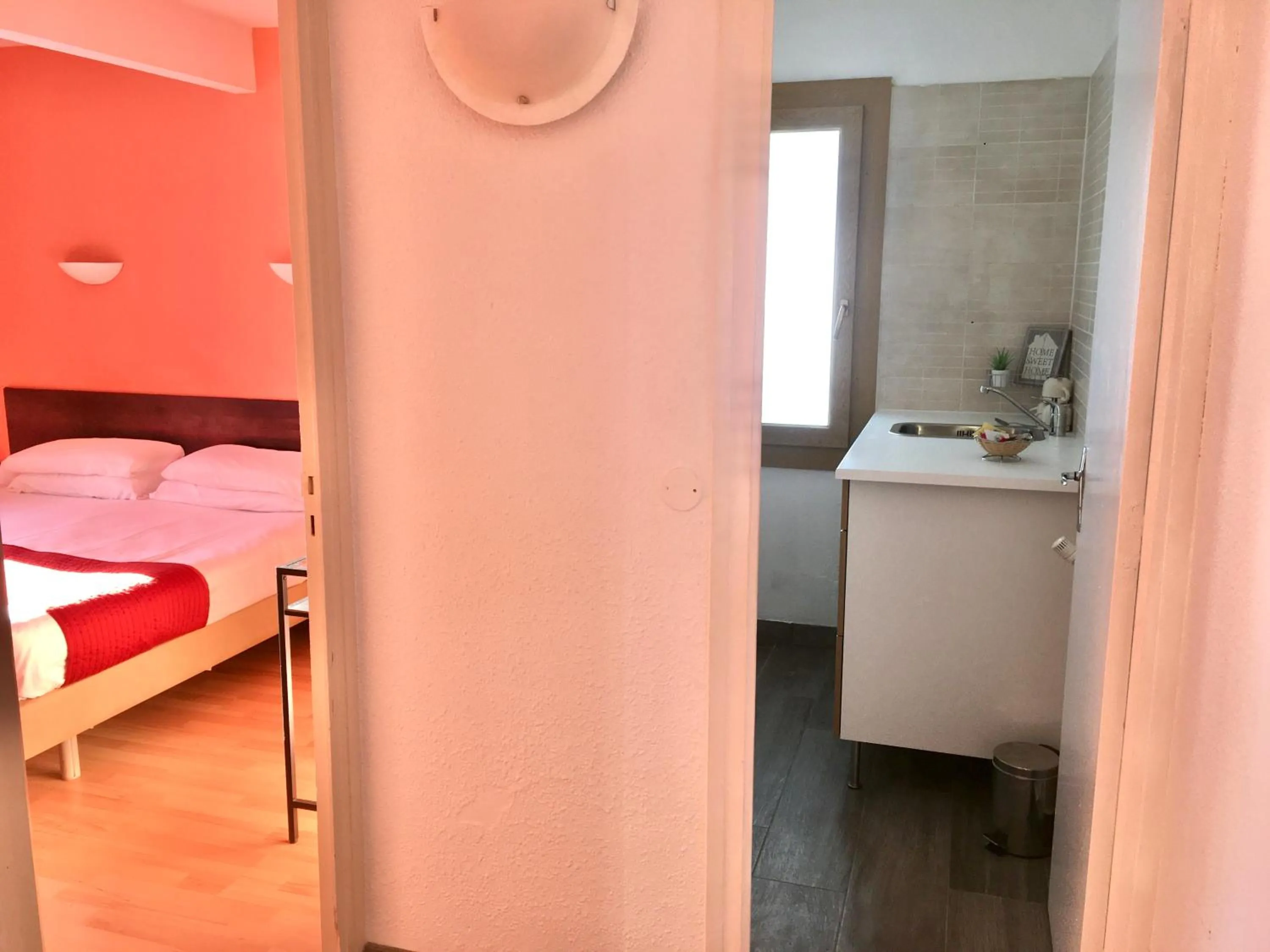 Kitchen or kitchenette, Bed in Hotel Roc de St Miquel & Apartment