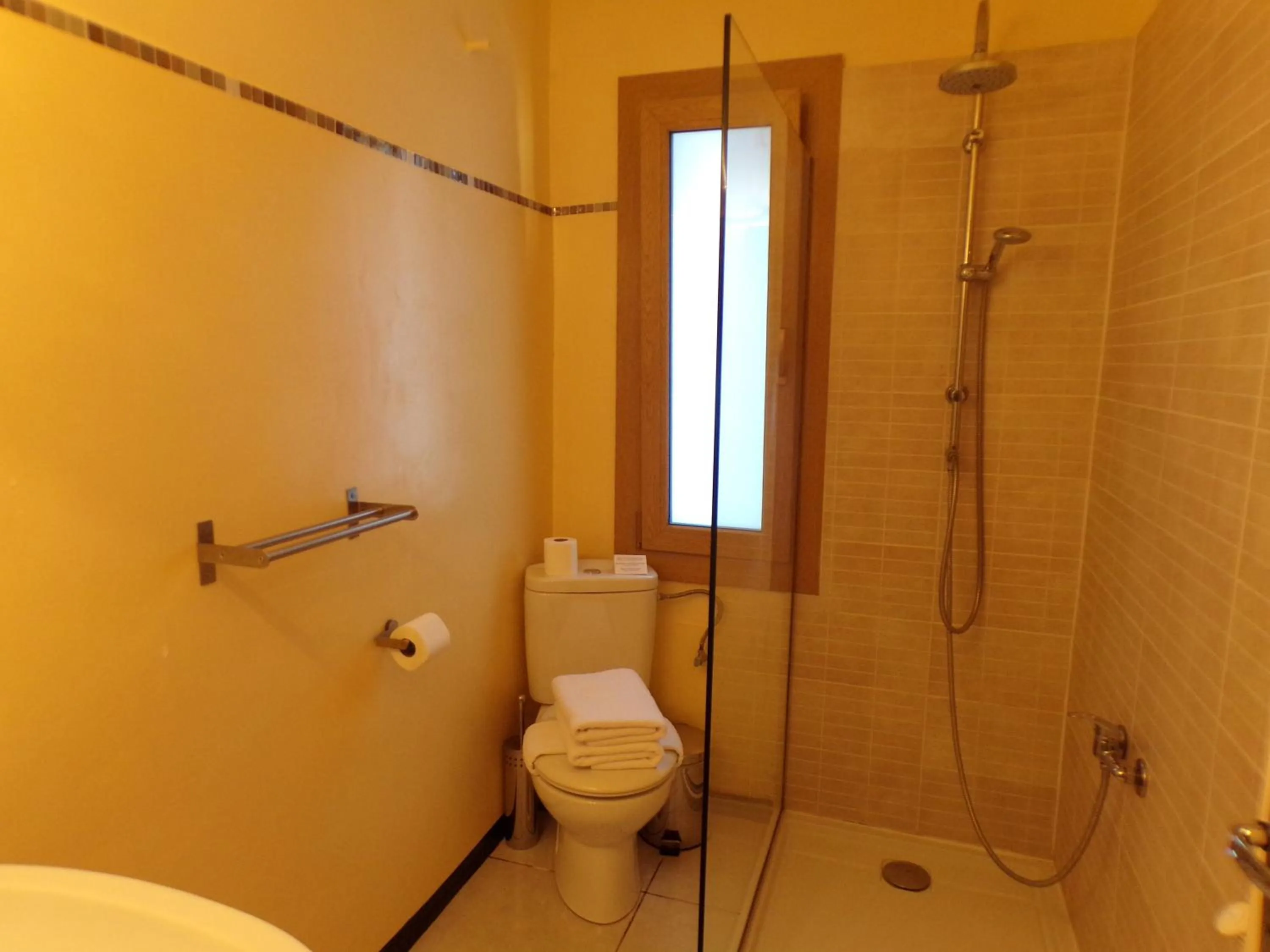 Bathroom in Hotel Roc de St Miquel & Apartment