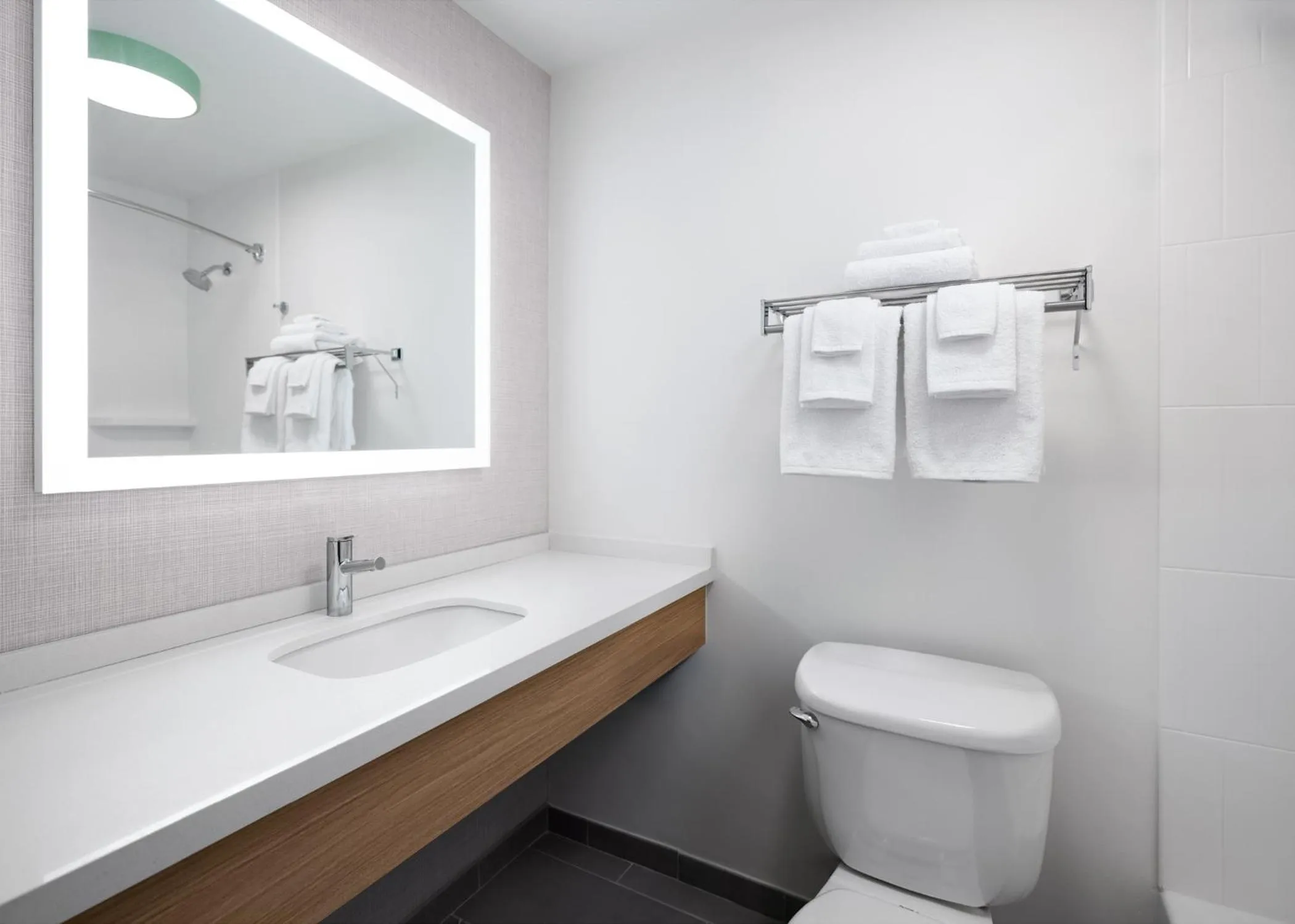 Bathroom in Garner Hotel Augusta West by IHG