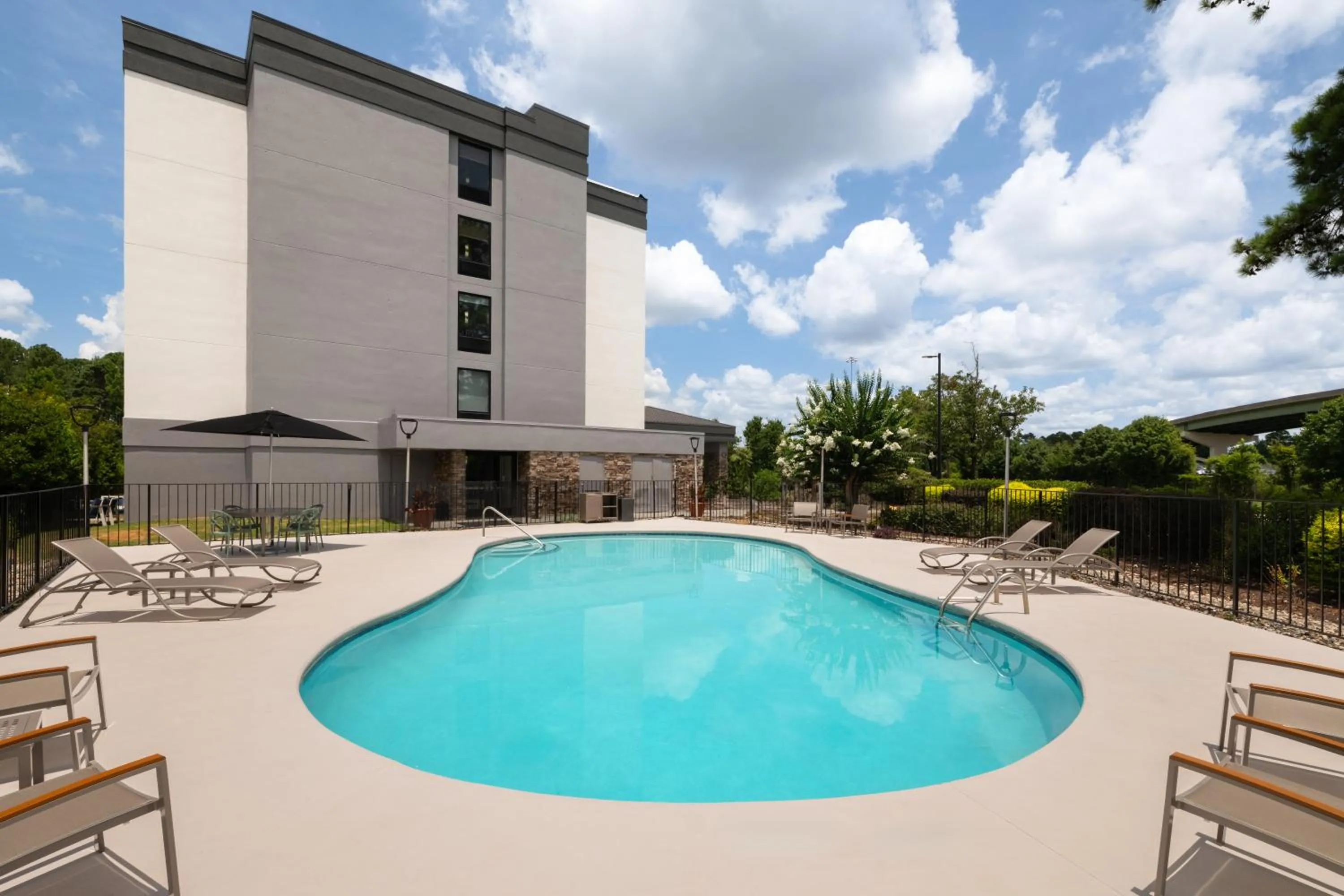 Swimming pool in Garner Hotel Augusta West by IHG