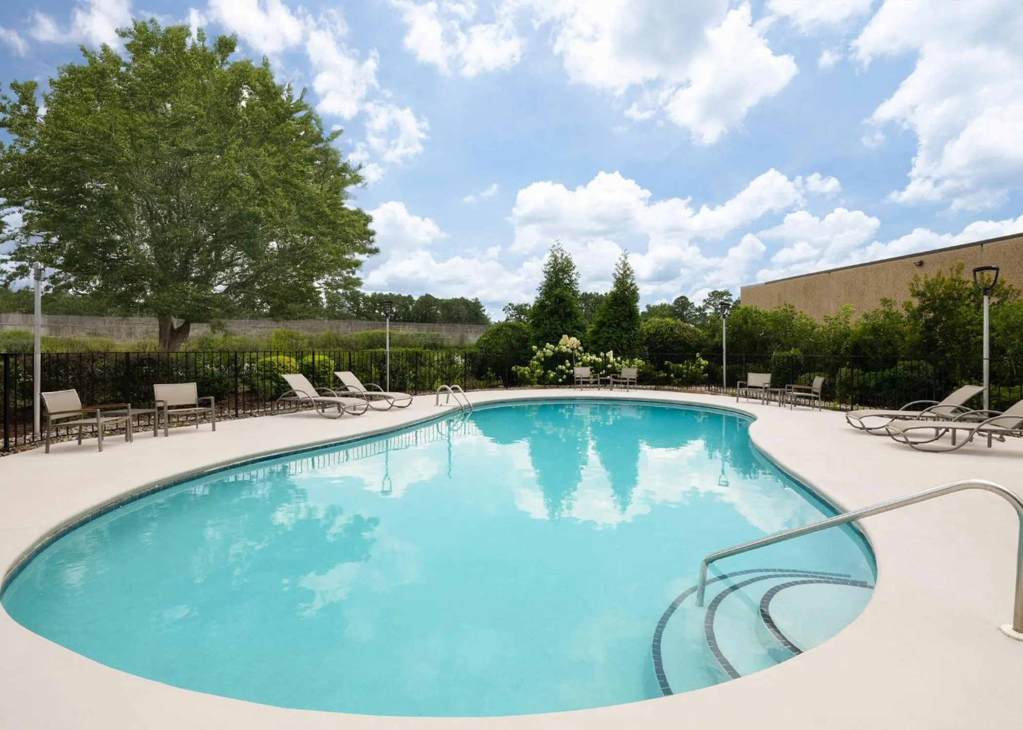Swimming pool in Garner Hotel Augusta West by IHG
