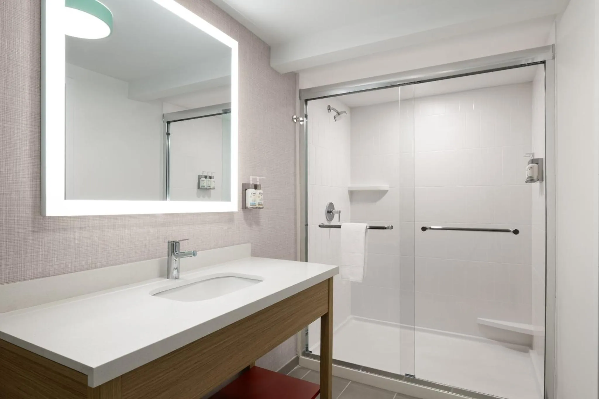 Bathroom in Garner Hotel Augusta West by IHG