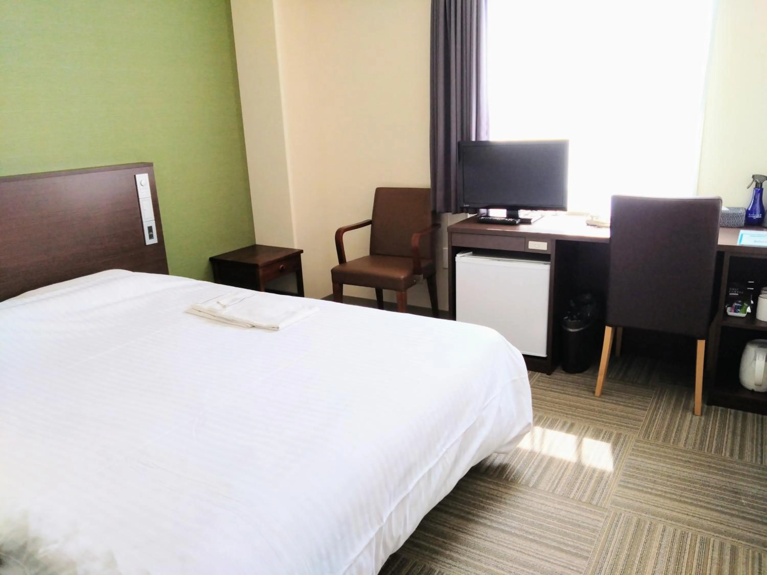 Bed in New Matto Terminal Hotel