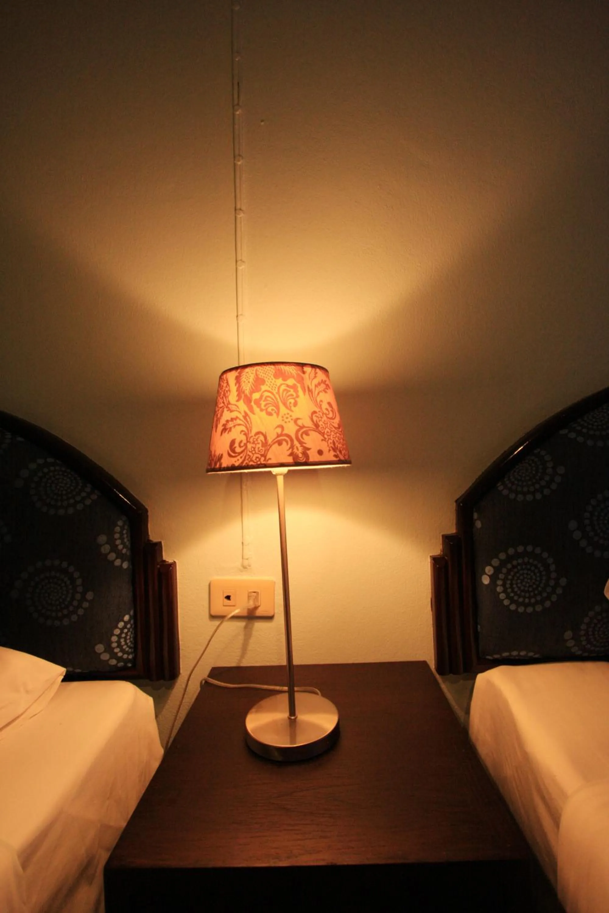 Bed in Chaba Chalet Hotel