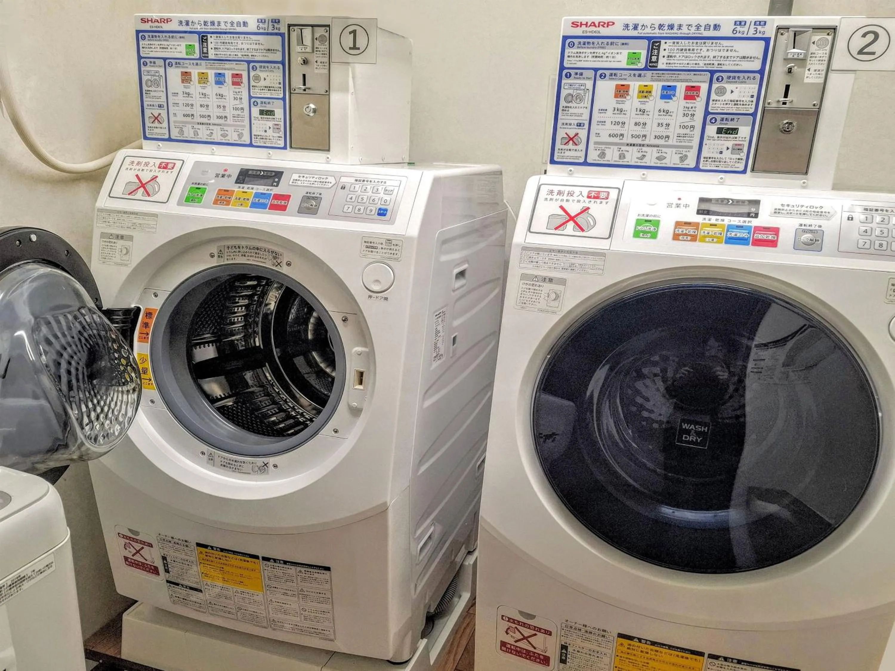 washing machine in Hotel Green Mark