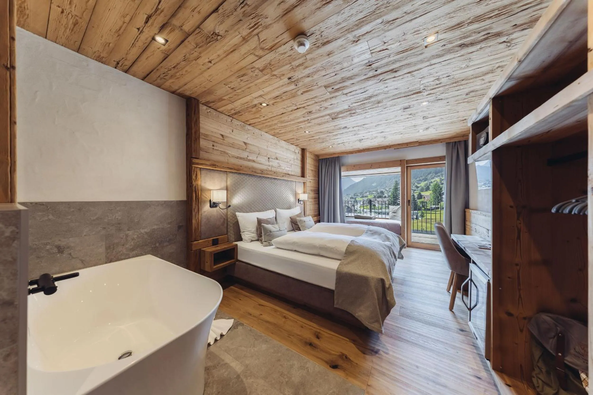 Photo of the whole room, Bed in Genusshotel Vermala Montafon