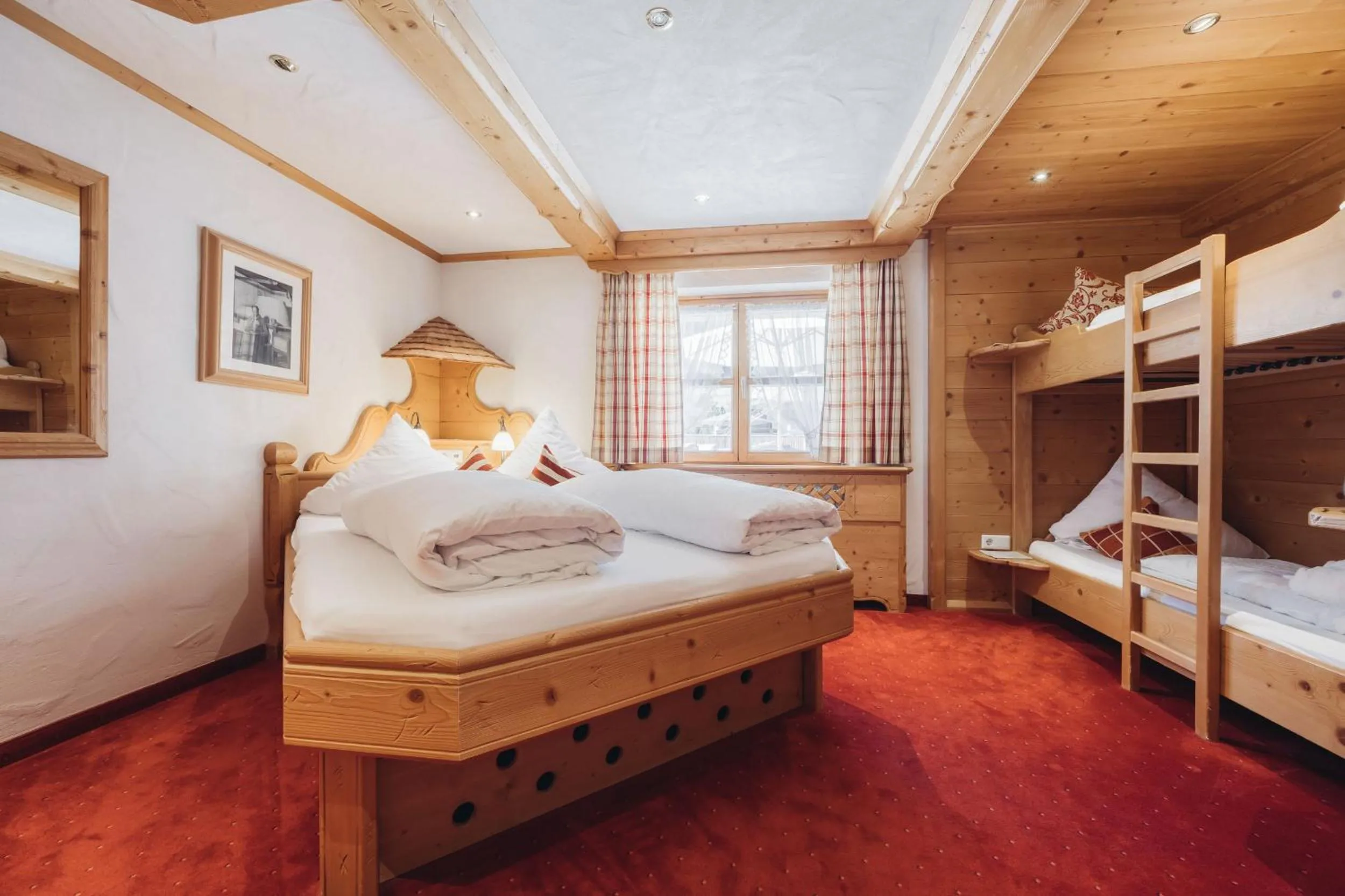 Photo of the whole room, Bed in Genusshotel Vermala Montafon
