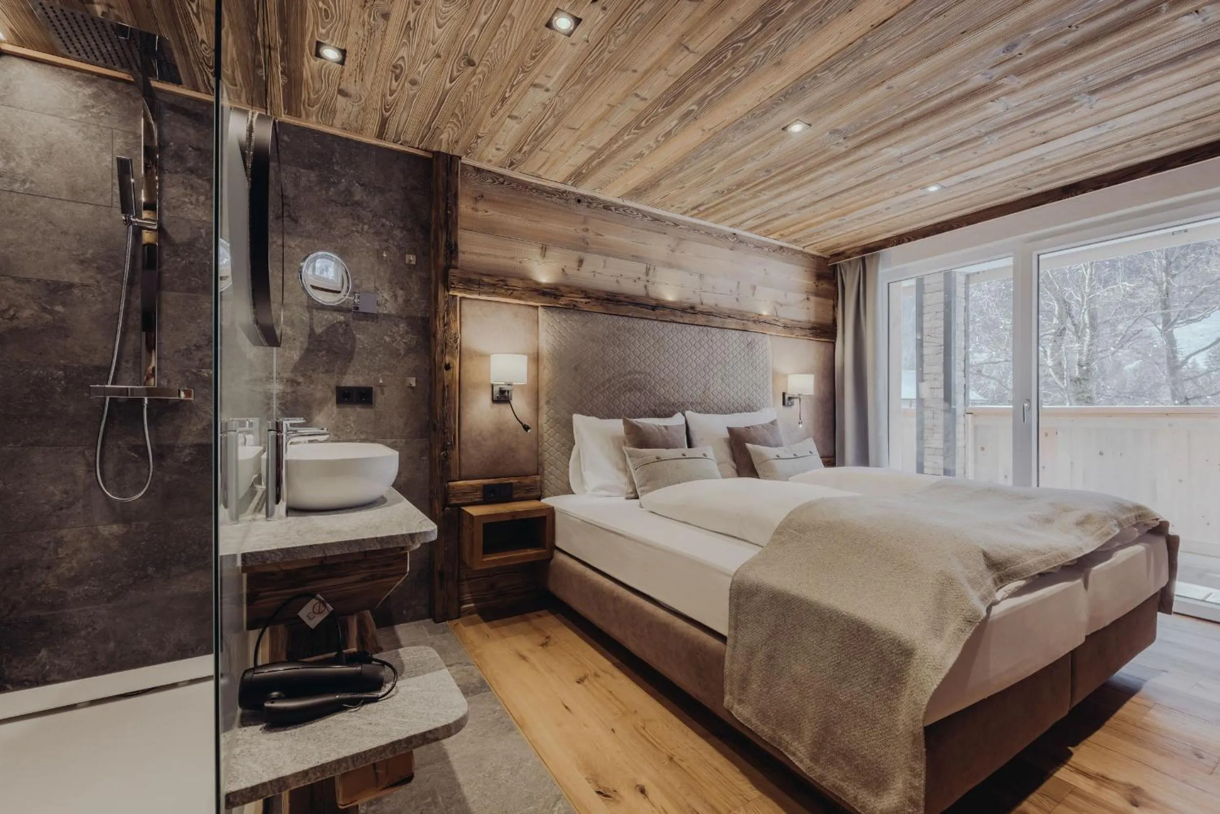 Photo of the whole room, Bed in Genusshotel Vermala Montafon