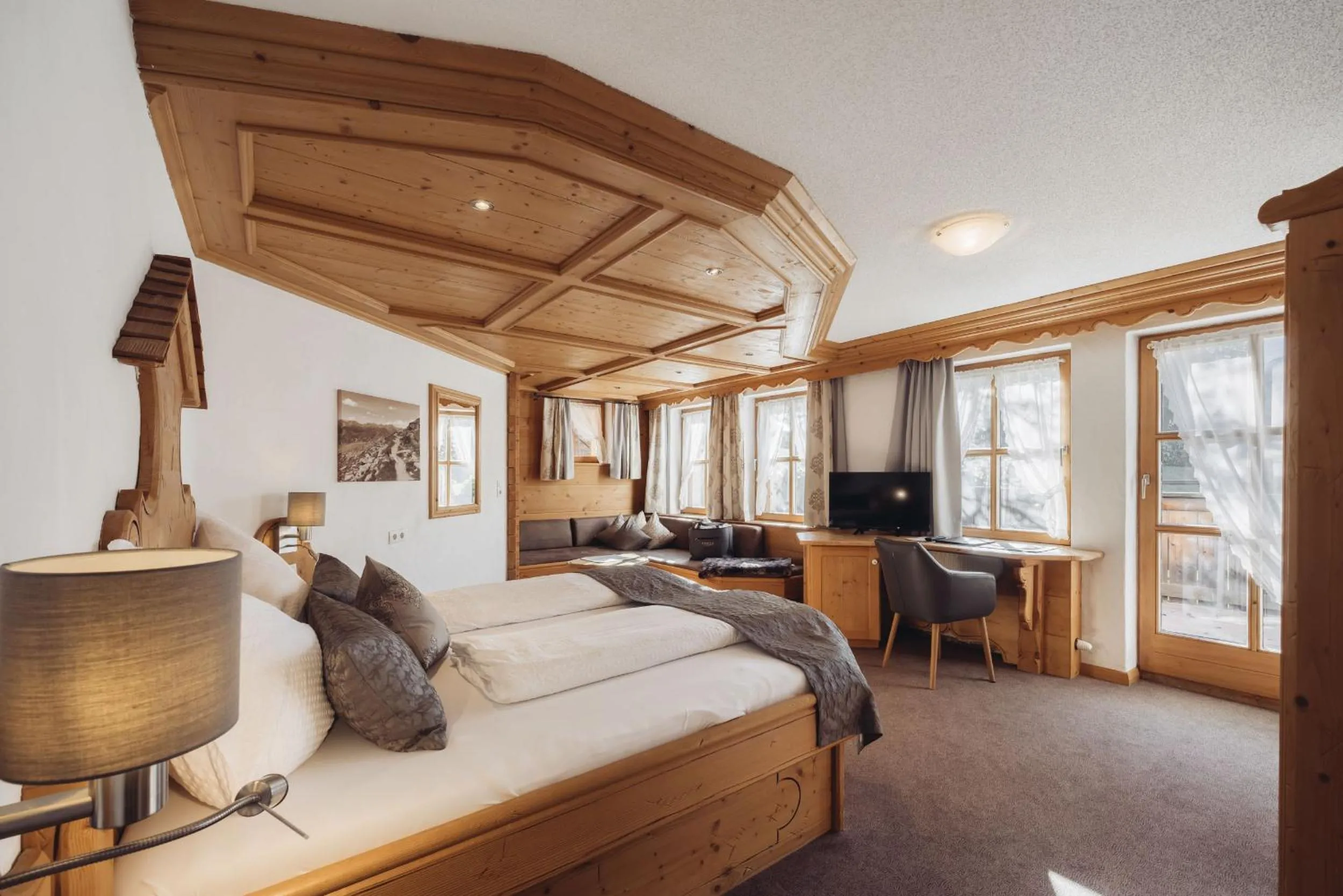 Photo of the whole room, Bed in Genusshotel Vermala Montafon