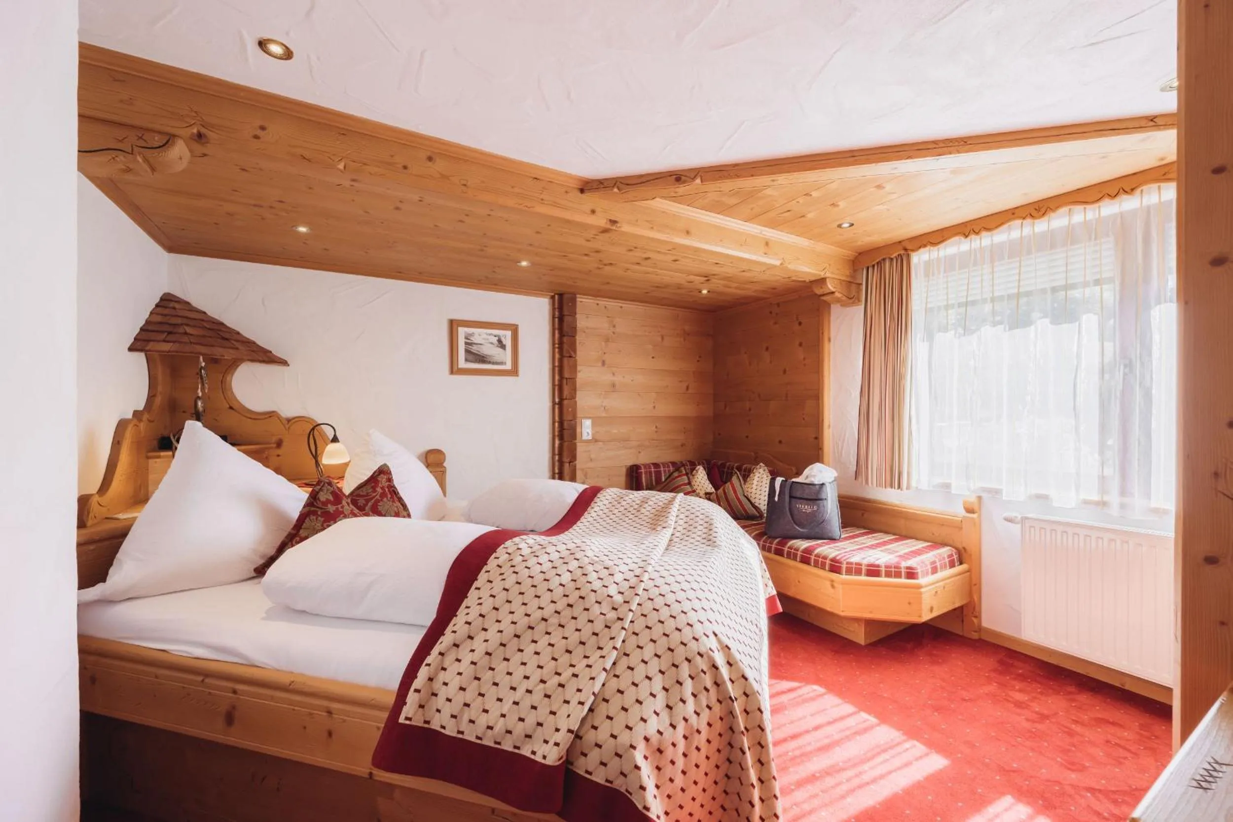 Photo of the whole room, Bed in Genusshotel Vermala Montafon
