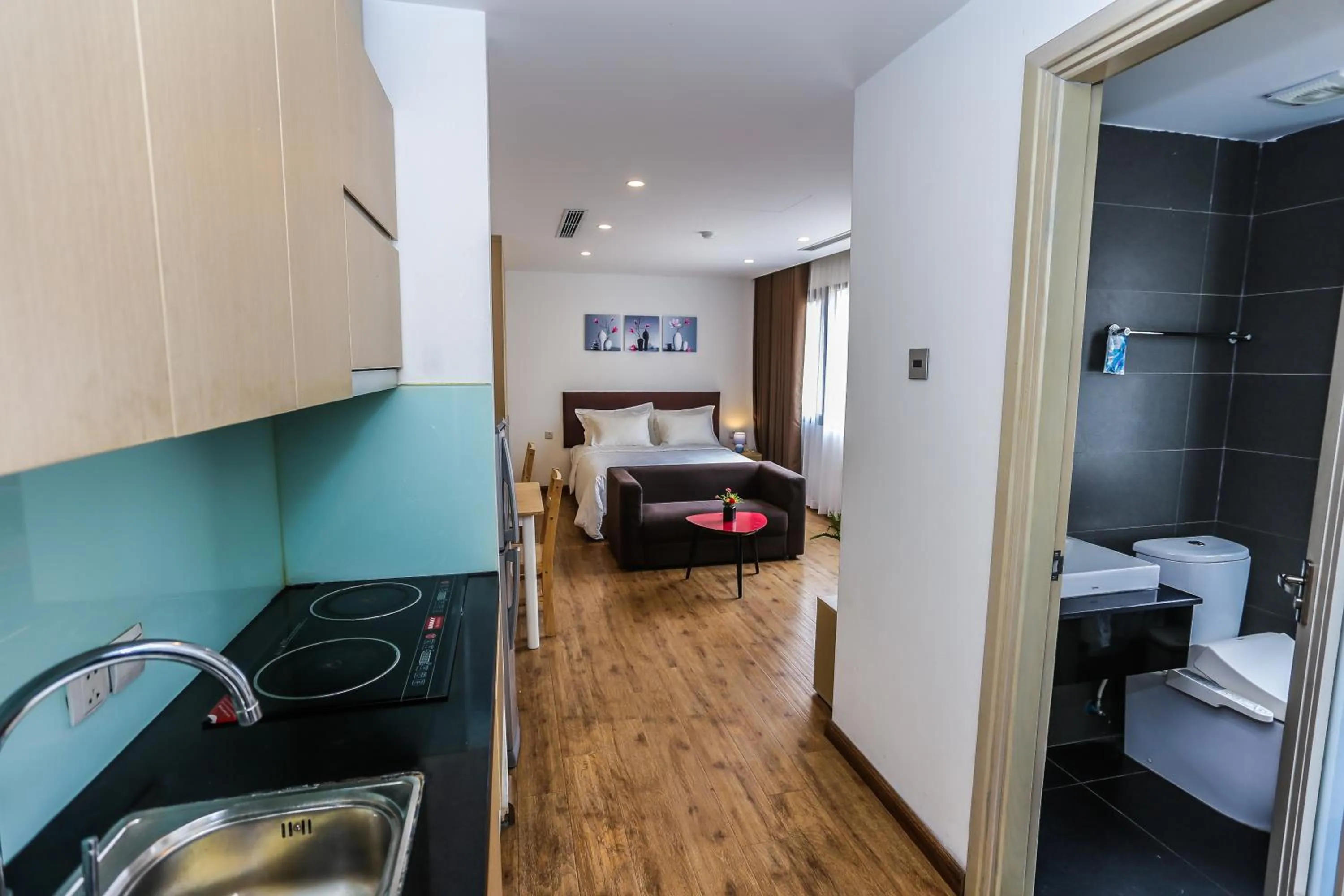 Kitchen or kitchenette, Bed in Ficus Suites