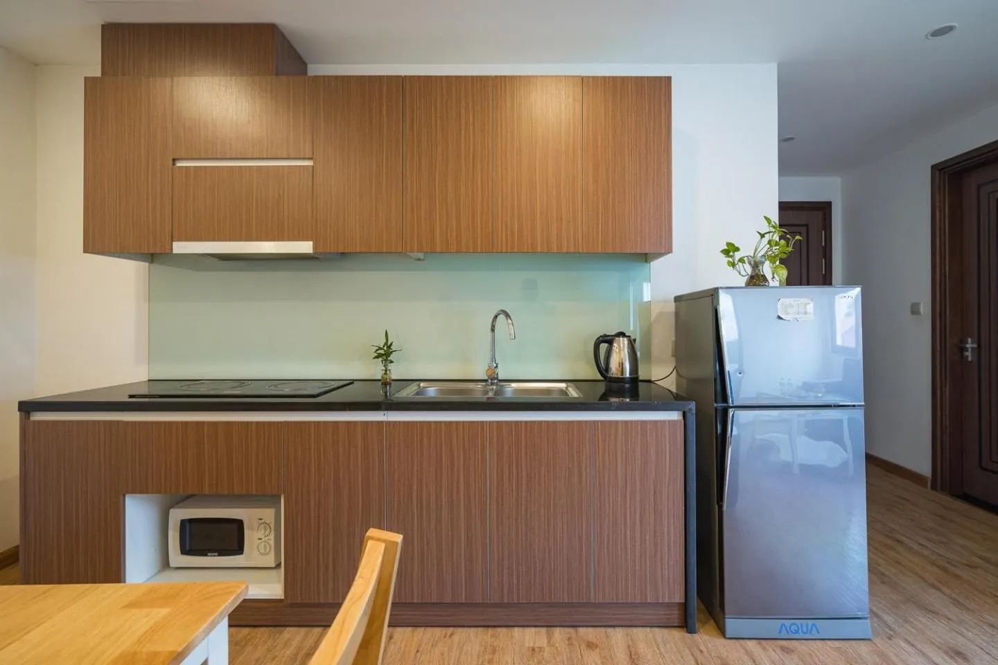 Kitchen or kitchenette in Ficus Suites