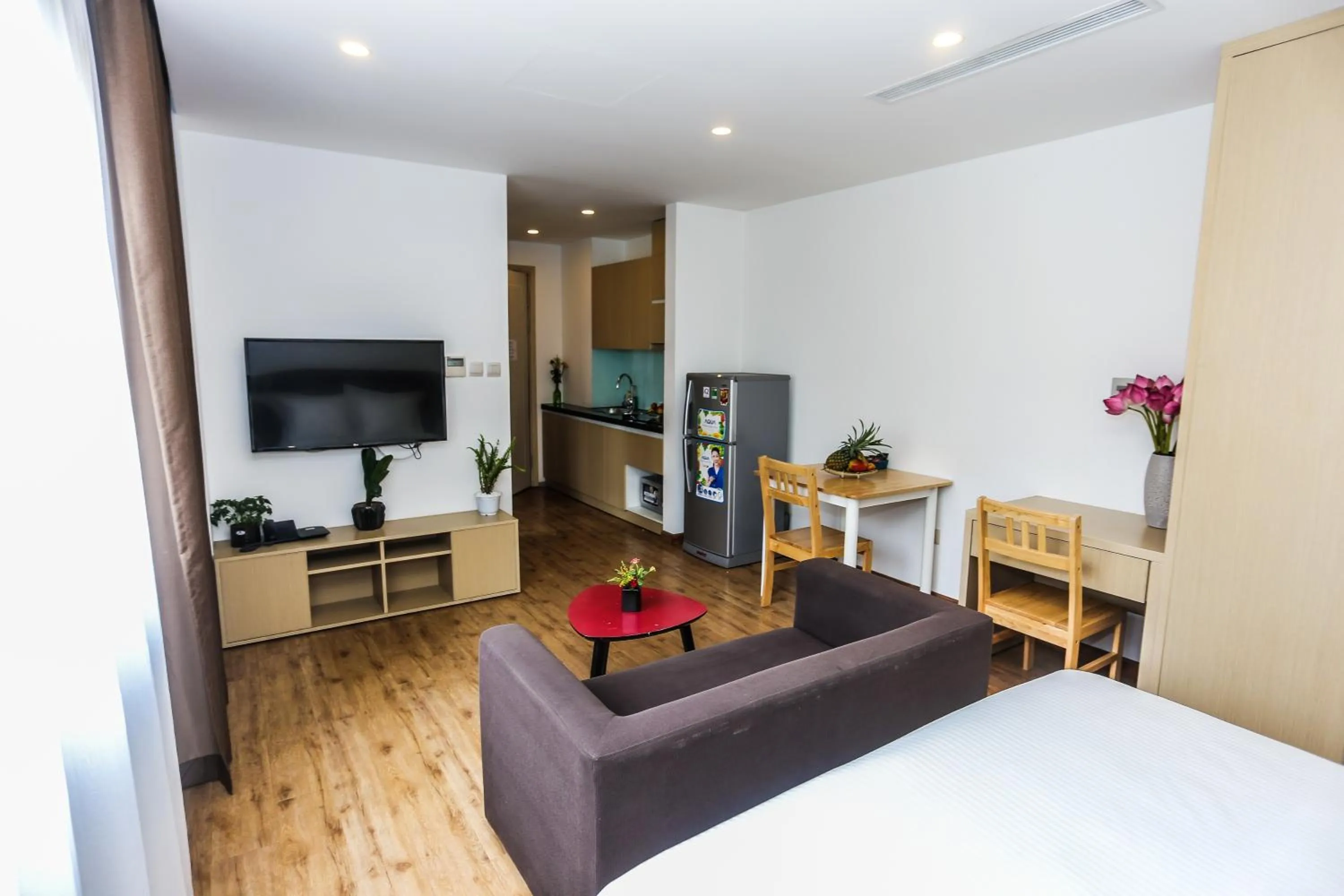 Living room, Bed in Ficus Suites
