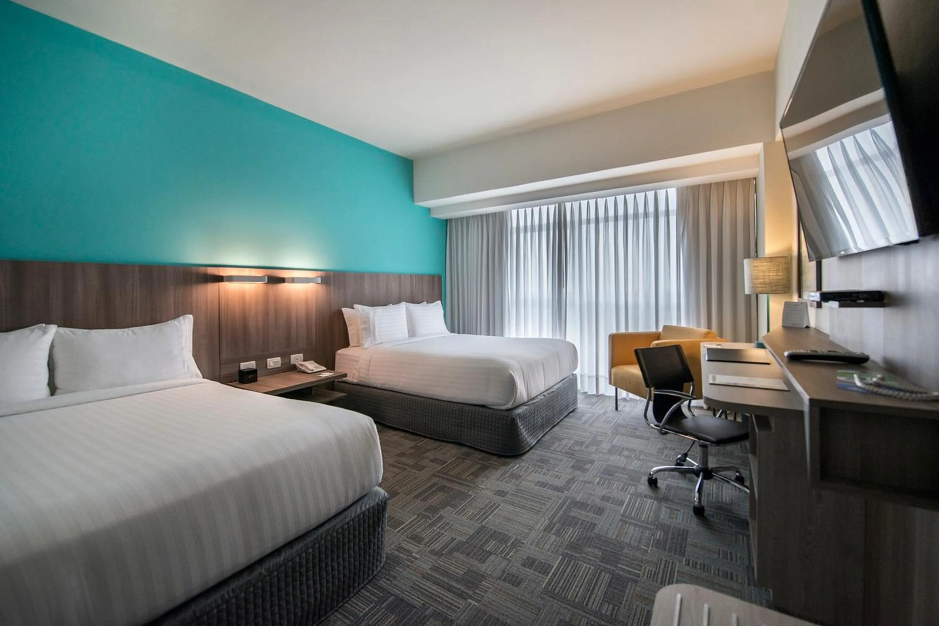 Photo of the whole room, Bed in Holiday Inn - Lima Airport by IHG