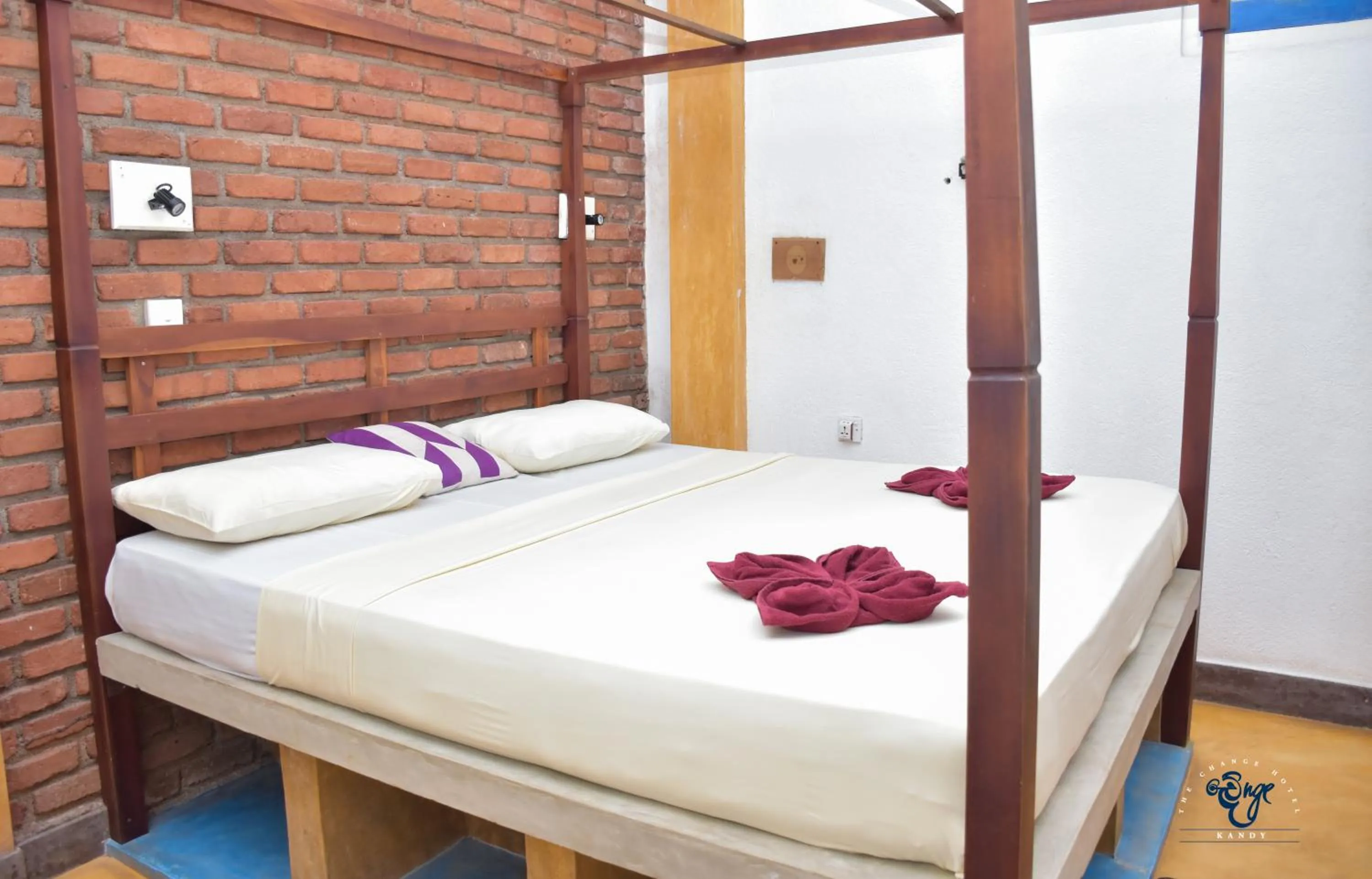 Bed in The Change Hotel