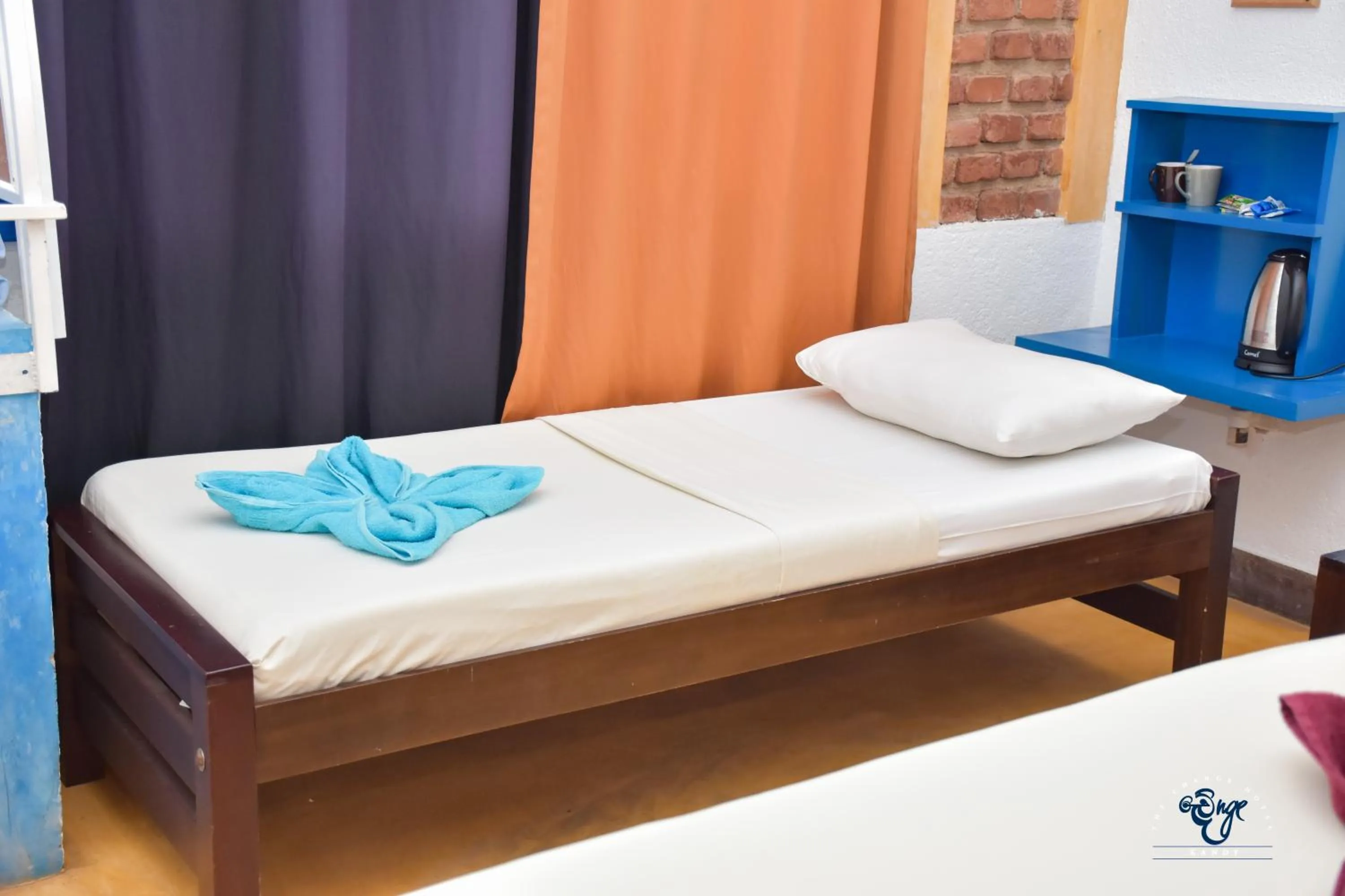 Bed in The Change Hotel