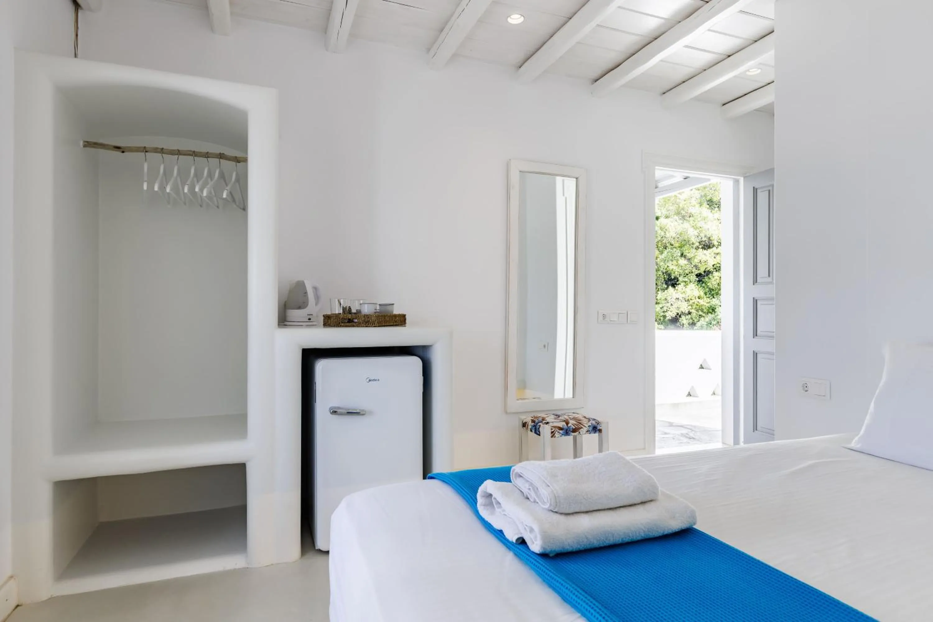 Bed in Evlalia Studios & Villas
