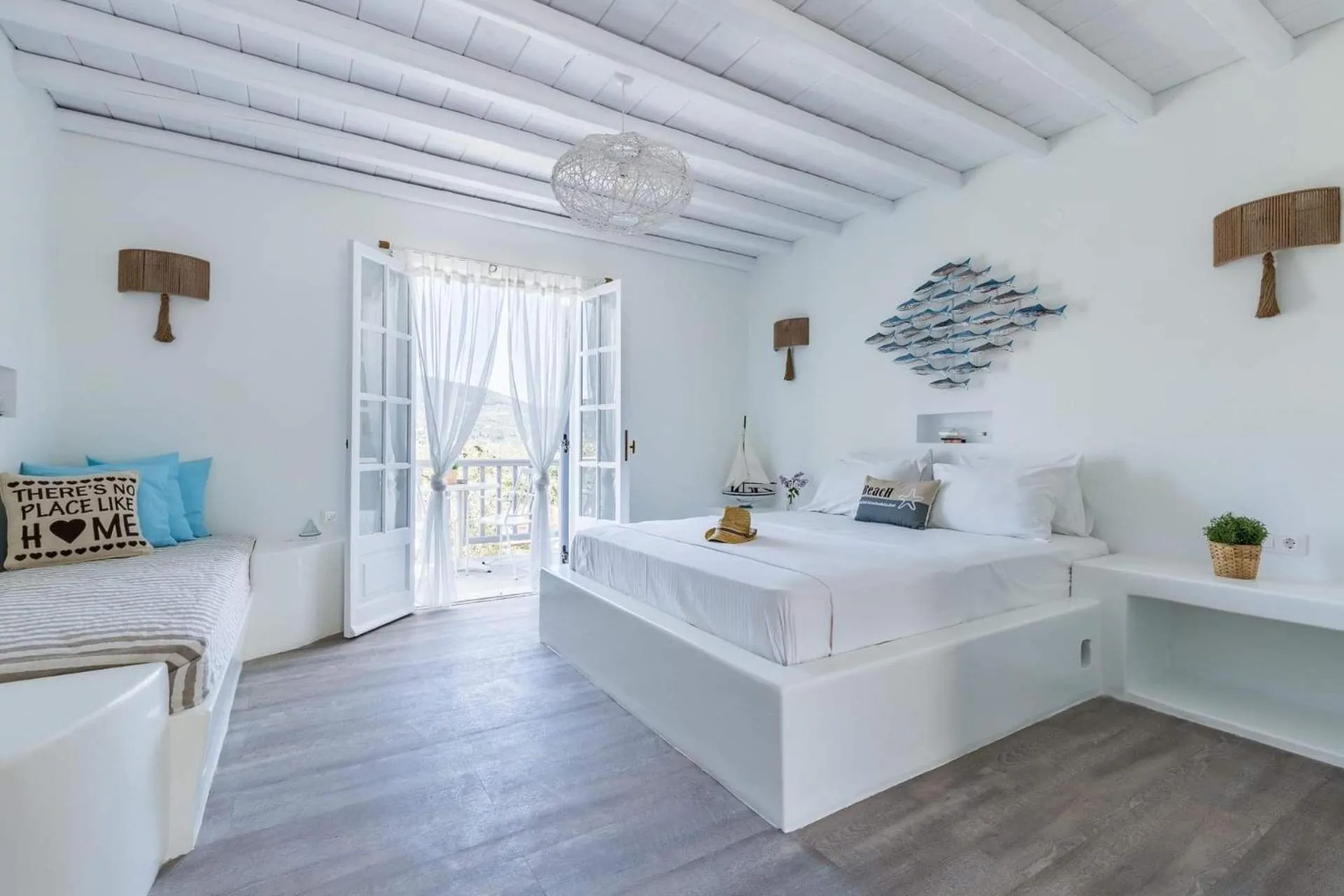 Bed in Evlalia Studios & Villas