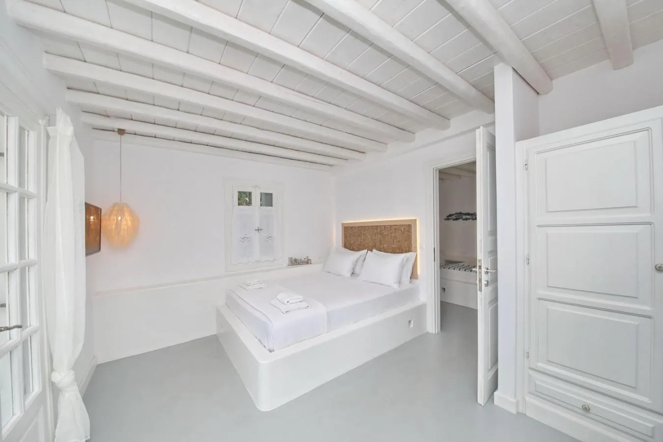 Bed in Evlalia Studios & Villas